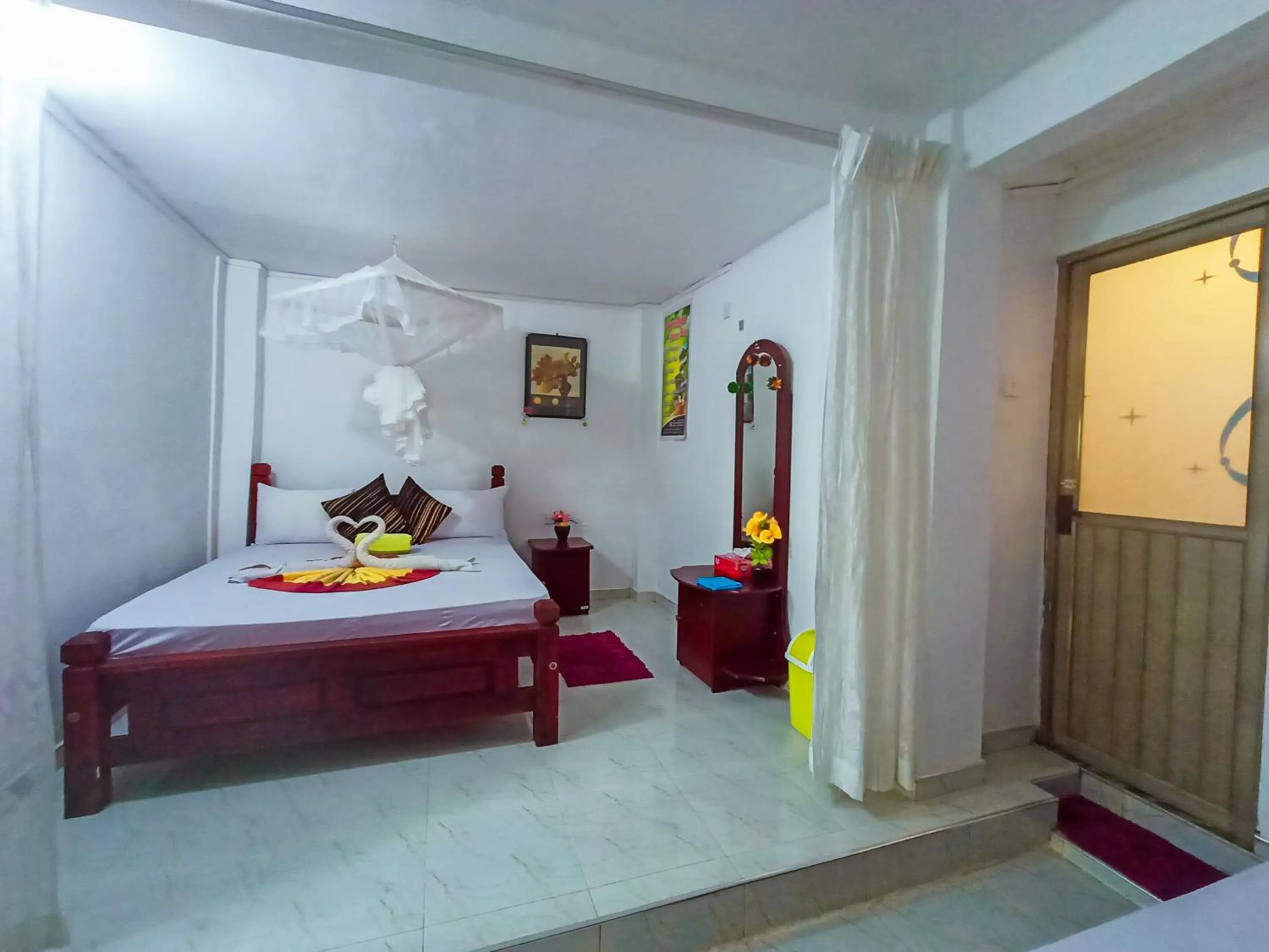 Bed in Sigiri Tarushan Home Stay