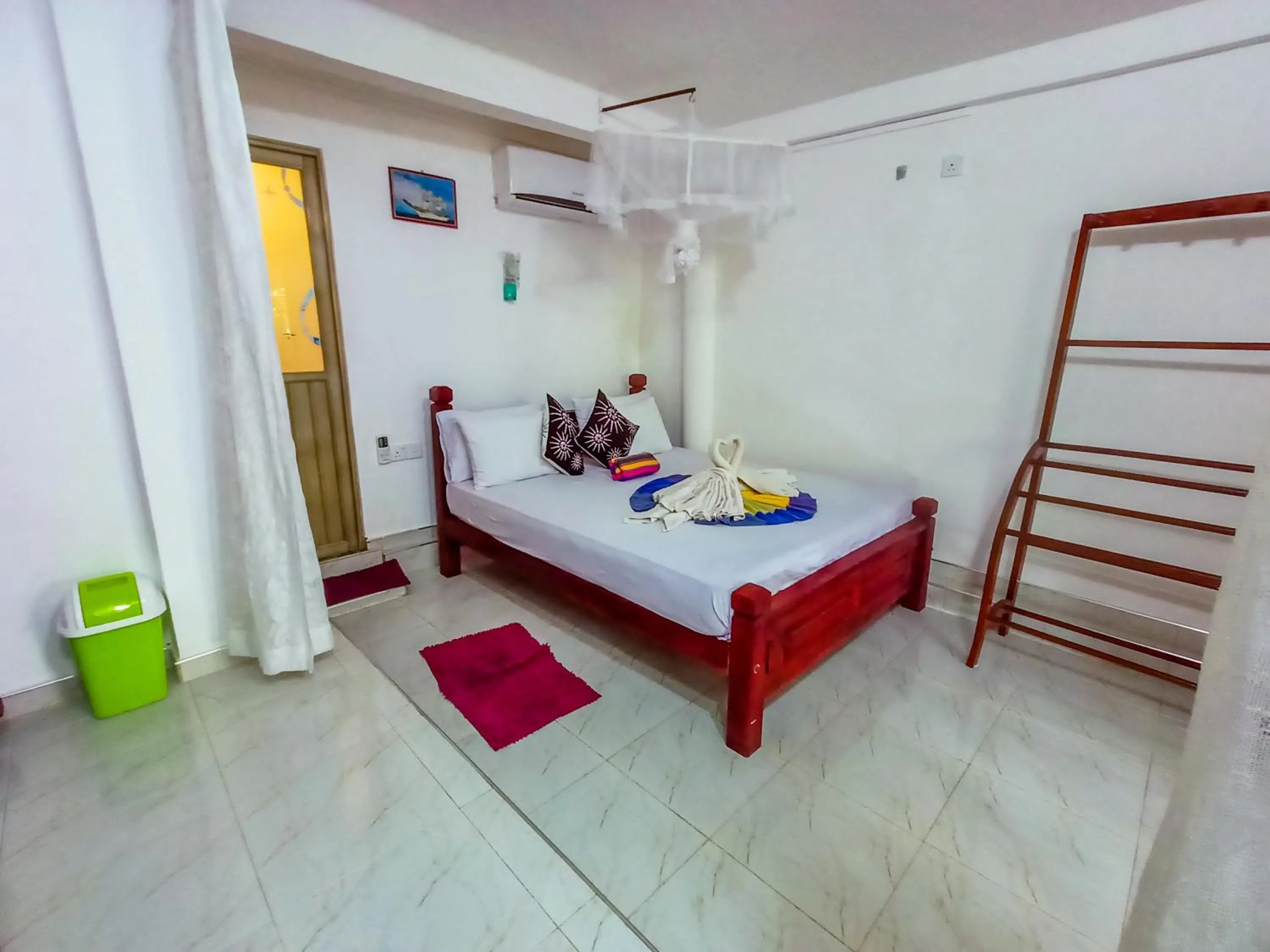 Bed in Sigiri Tarushan Home Stay