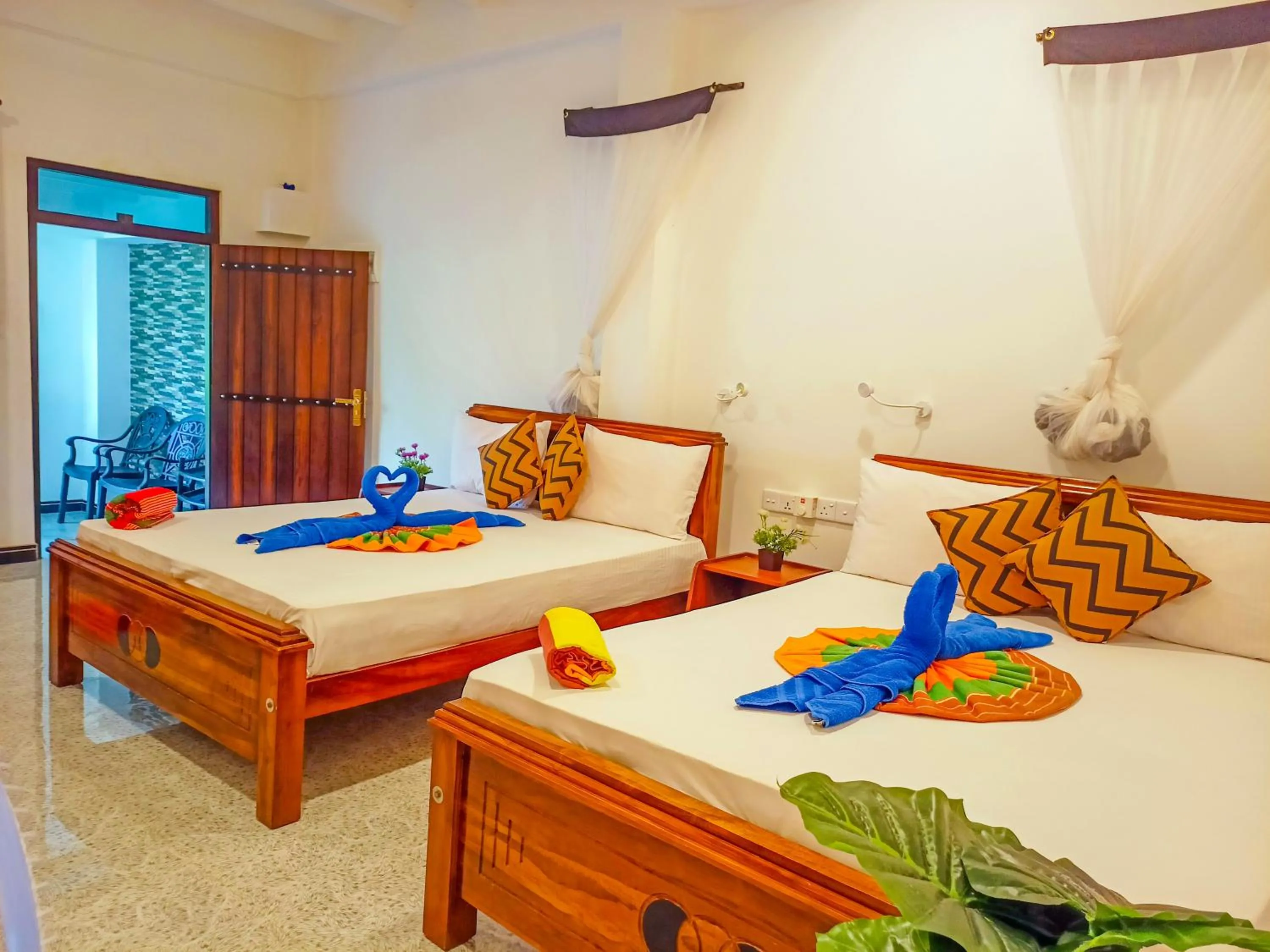 Photo of the whole room, Bed in Sigiri Tarushan Home Stay