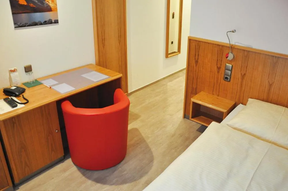 Bed in Garni Hotel Alber