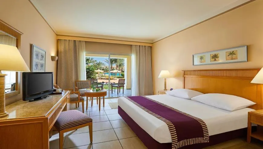 Photo of the whole room, Bed in JAZ Makadi Star & Spa