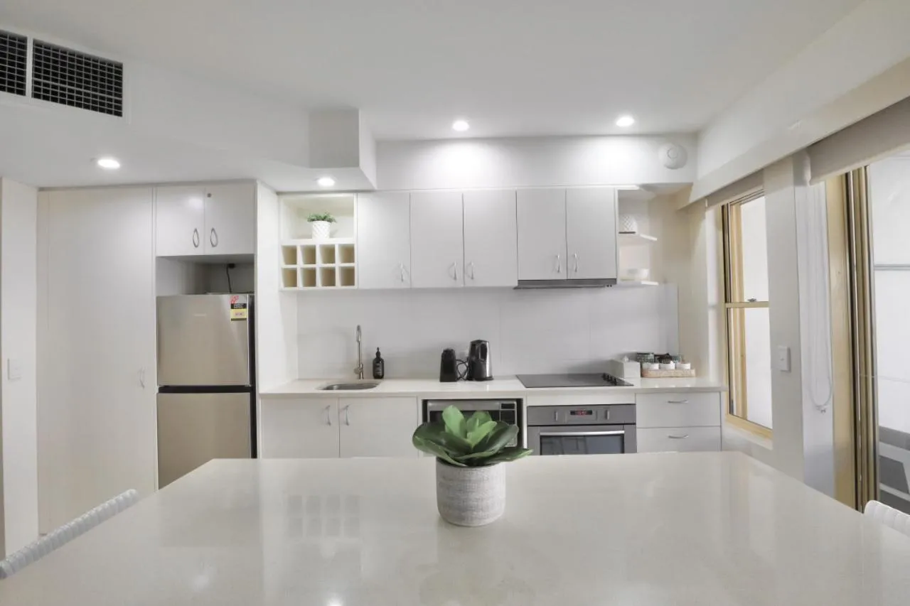 124 French Quarter TABI Hastings Street 2 bedroom walk to the beach