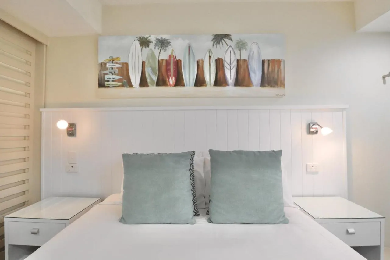 Bed in 124 French Quarter TABI Hastings Street 2 bedroom walk to the beach