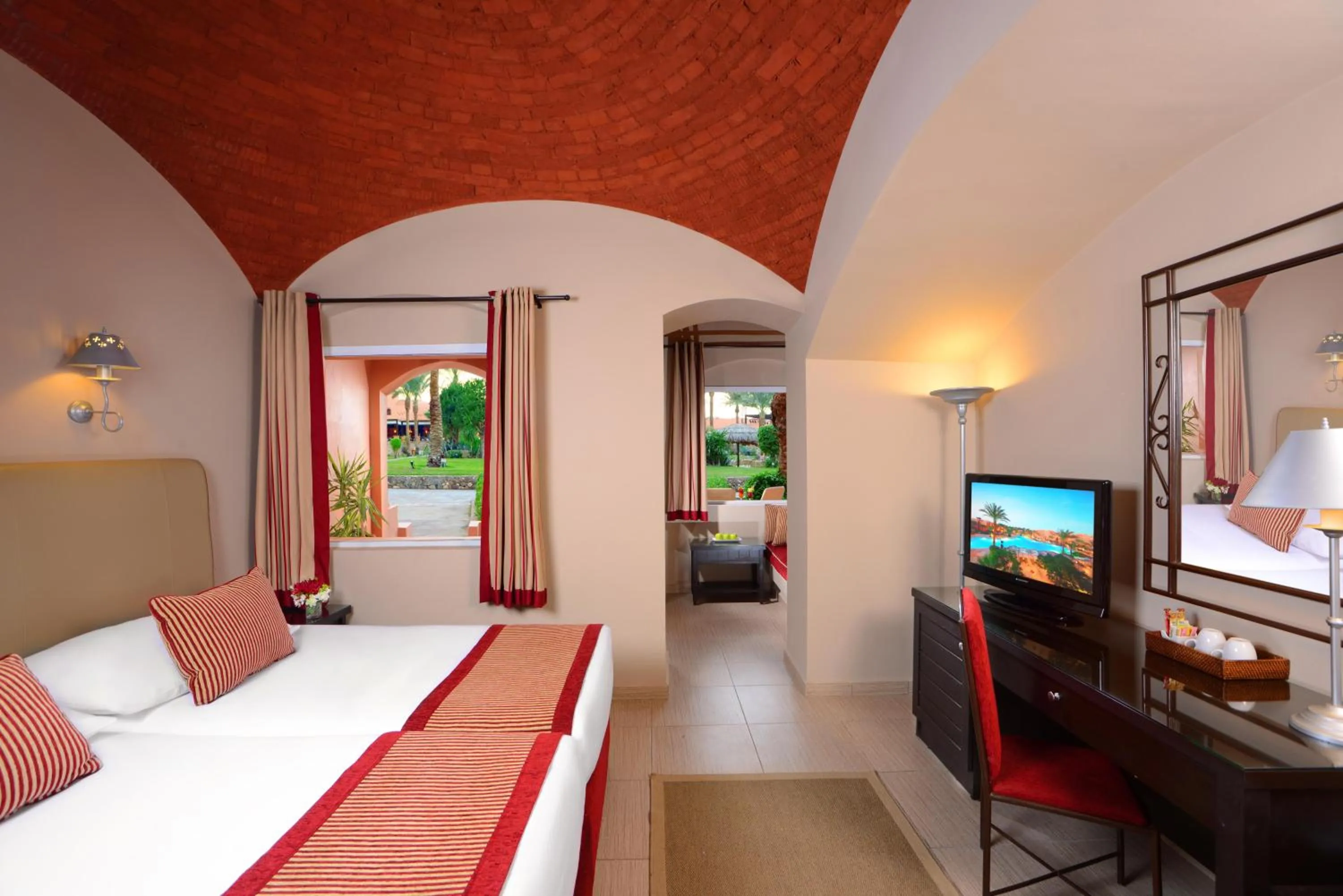 Photo of the whole room, Bed in JAZ Makadi Oasis Resort