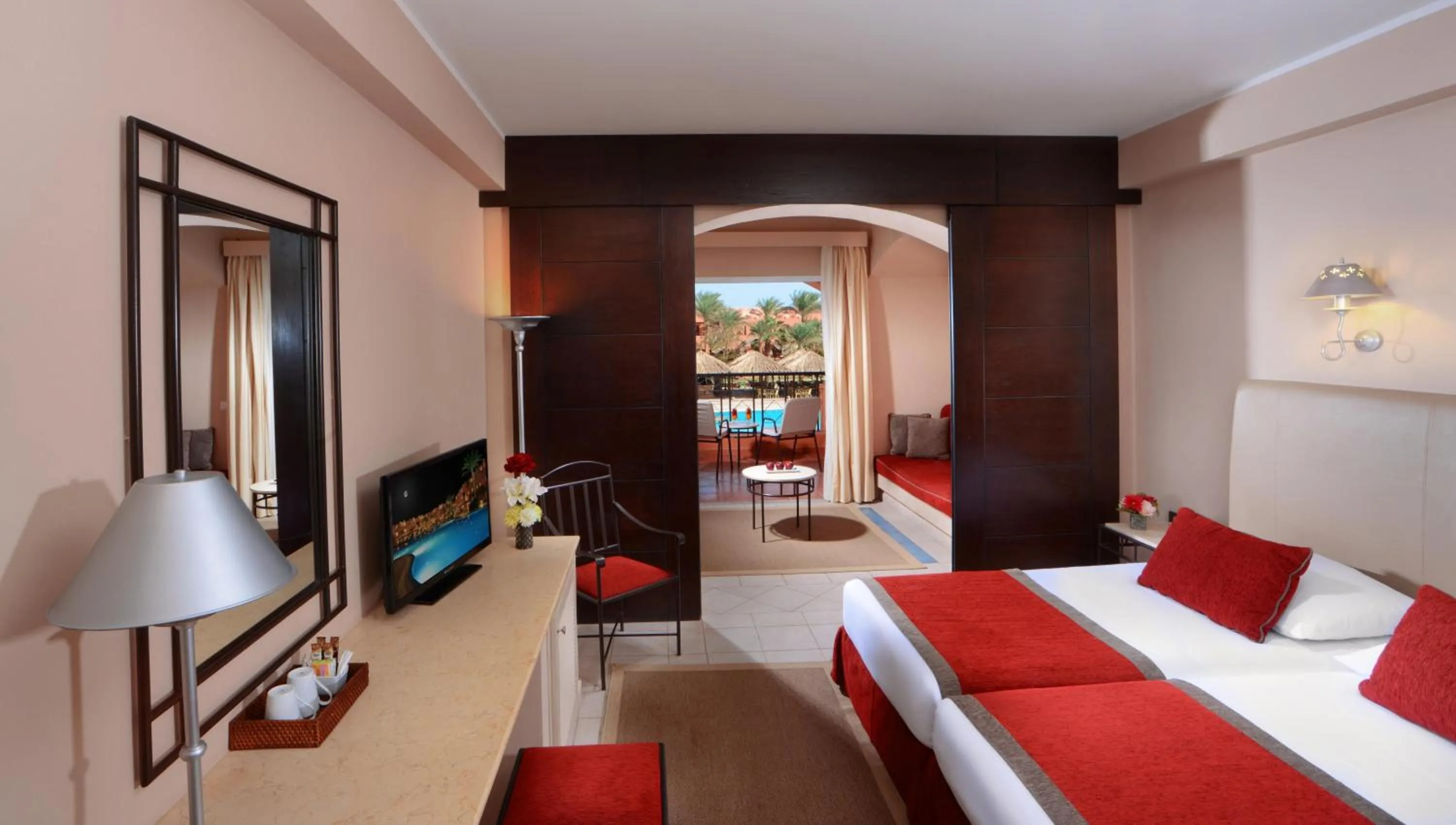 Photo of the whole room, Bed in JAZ Makadi Oasis Resort