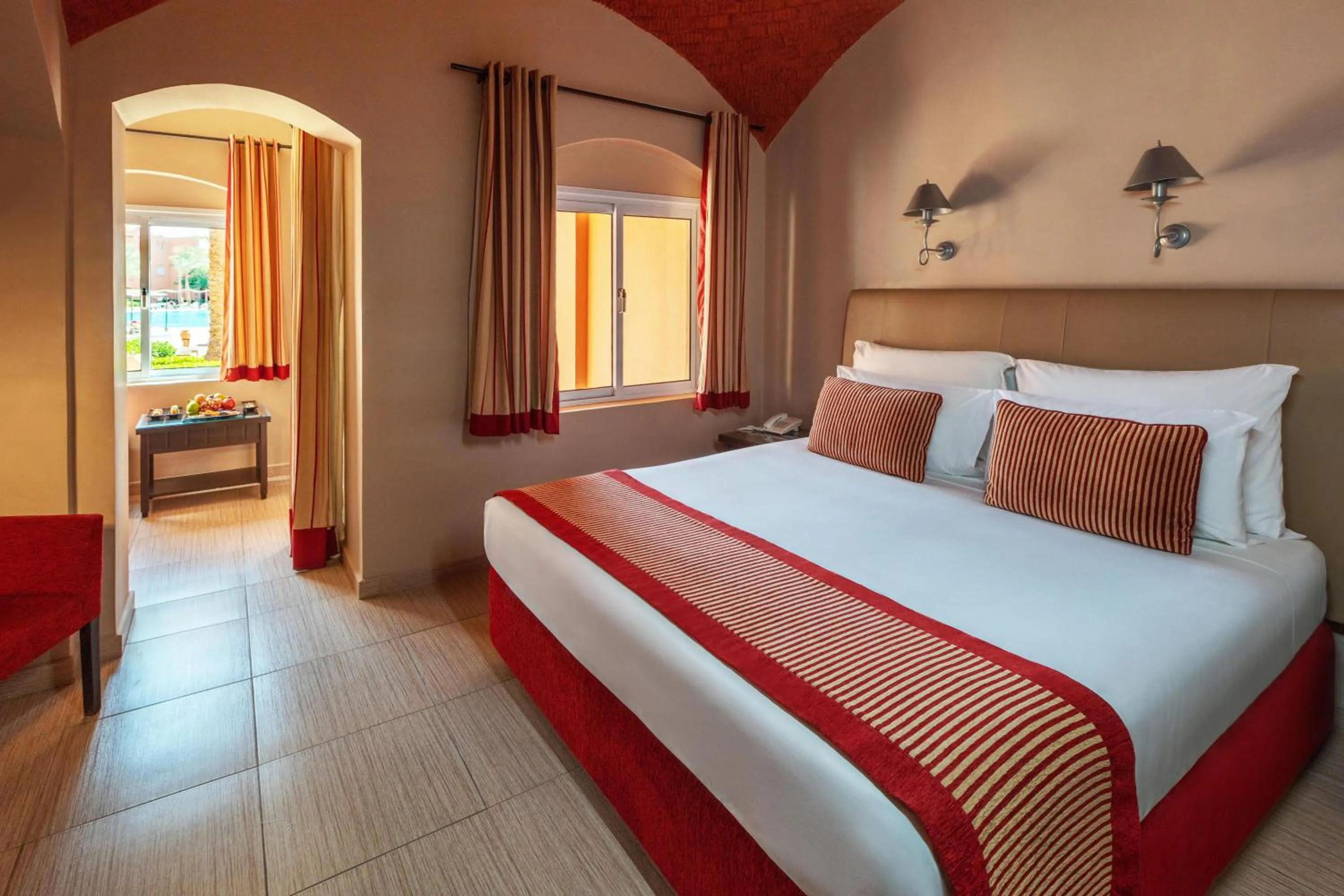 Photo of the whole room, Bed in JAZ Makadi Oasis Resort