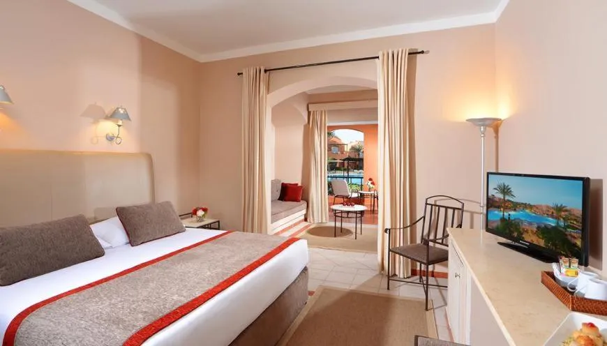 Photo of the whole room, Bed in JAZ Makadi Oasis Resort