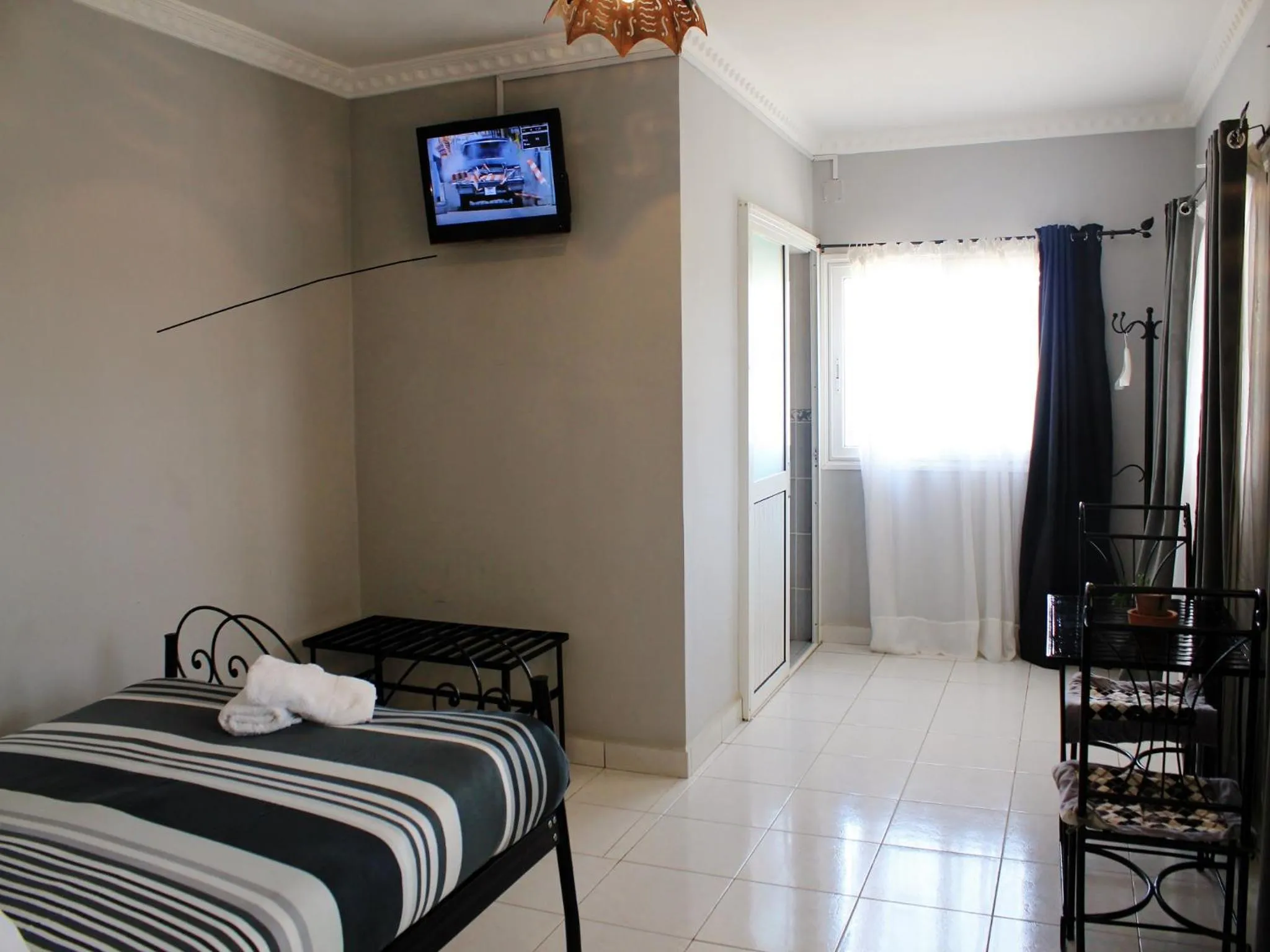 Bedroom in K.méléon-Hôtel