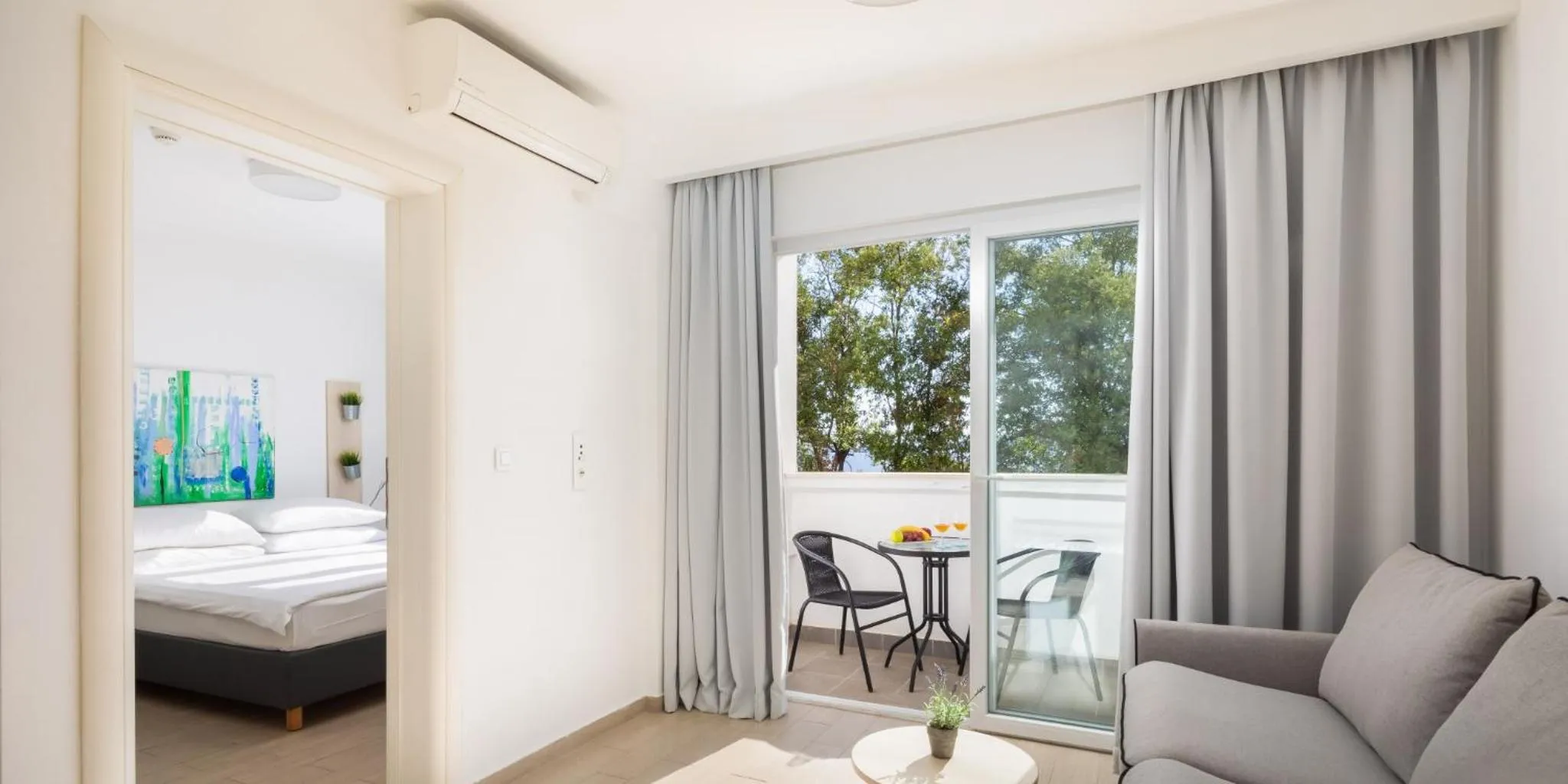 Living room, Bed in Bellevue Maradiso Casa by Aminess