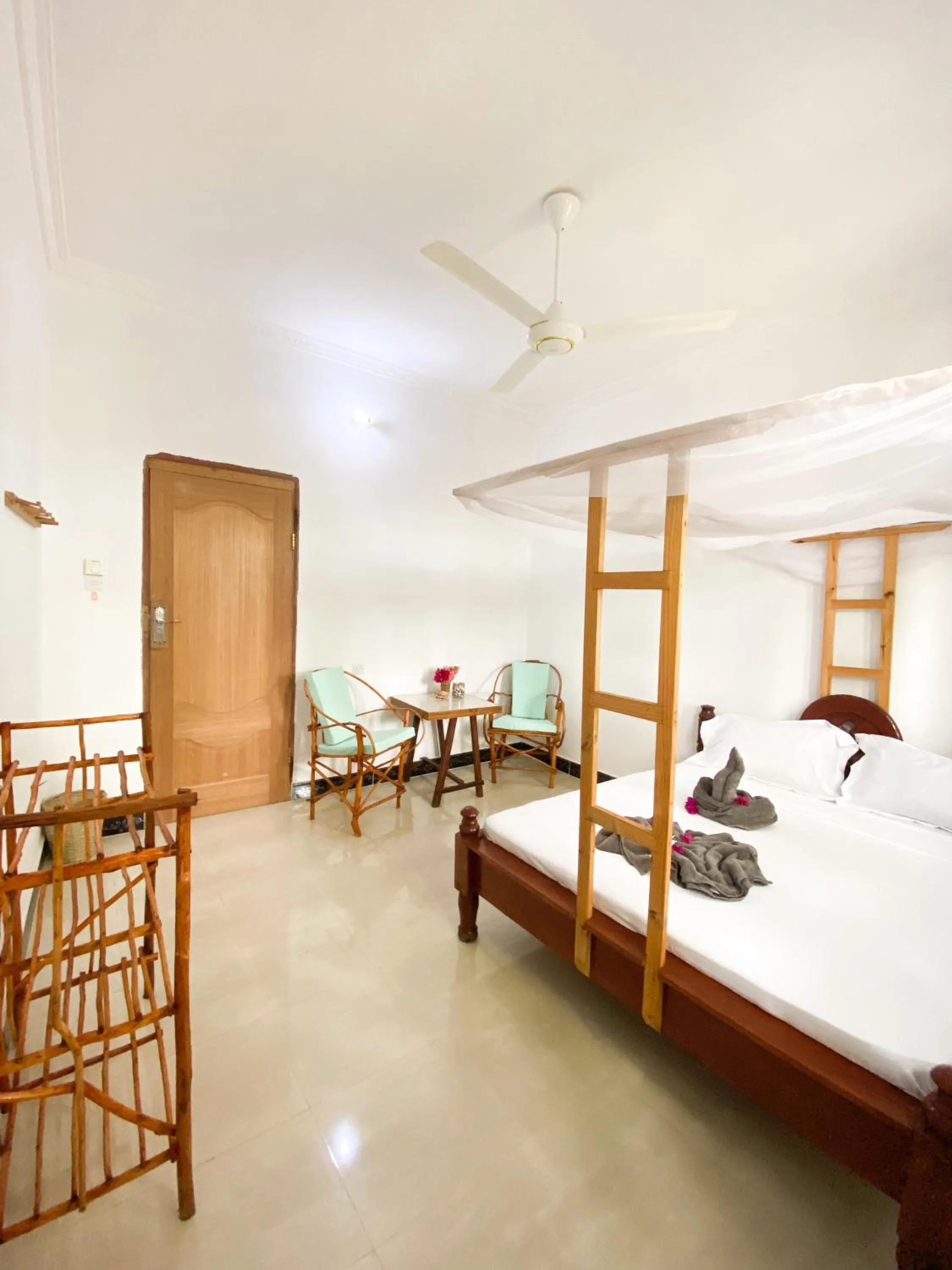 Seating area, Bed in Lighthouse Guesthouse