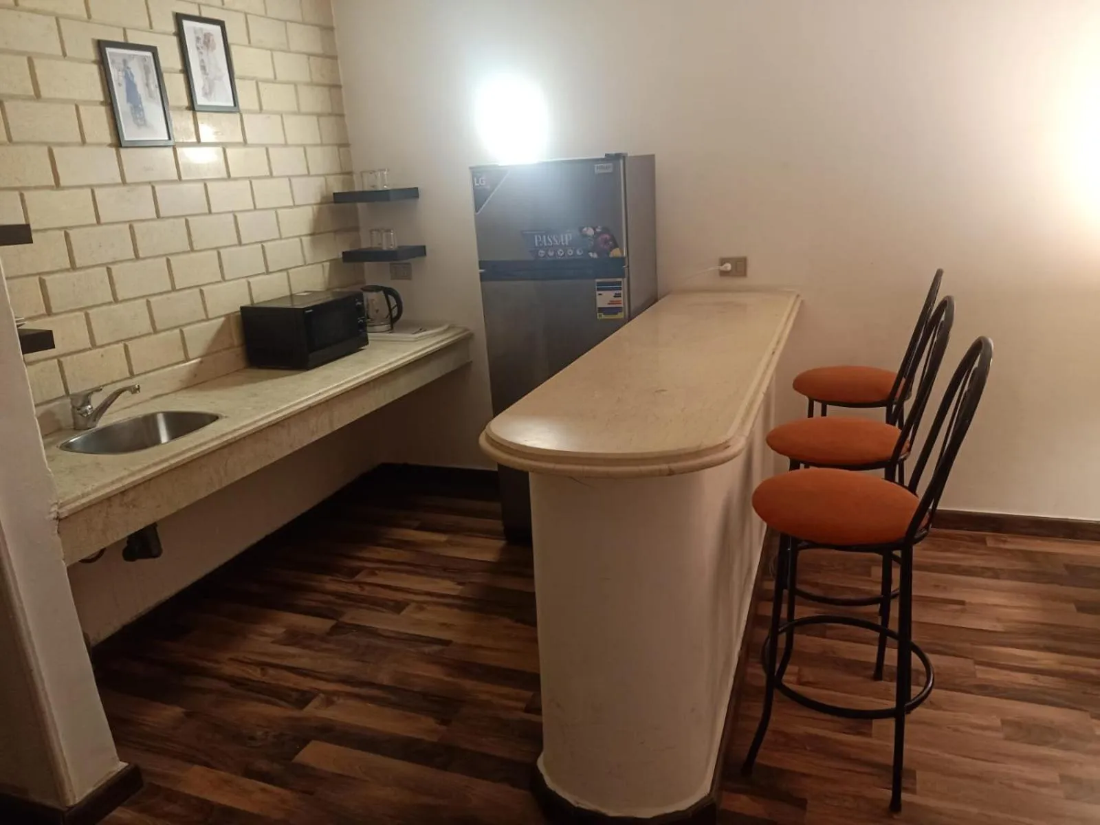 Kitchen or kitchenette in Golden Carven Hotel