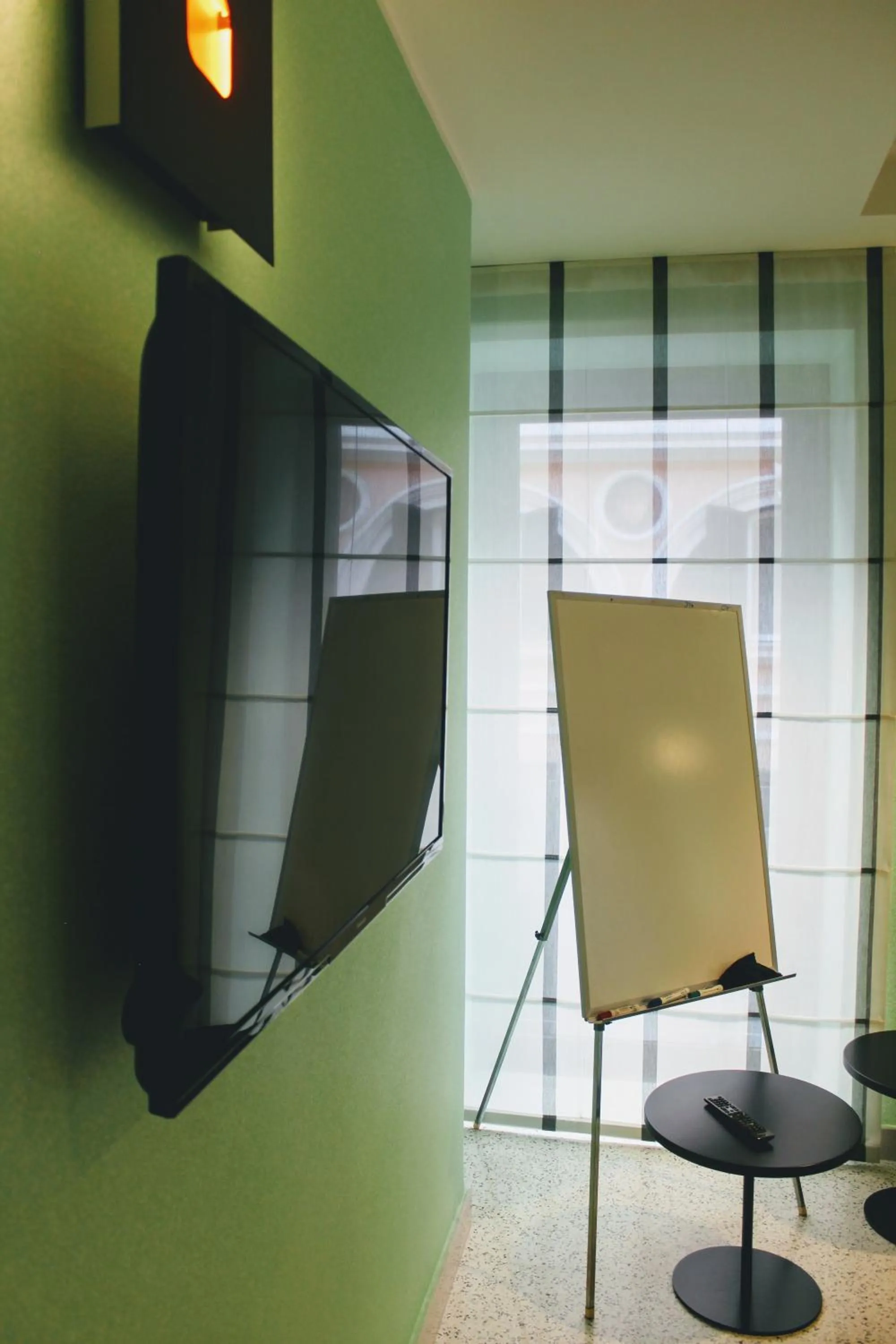 Communal lounge/ TV room in Domus Helena