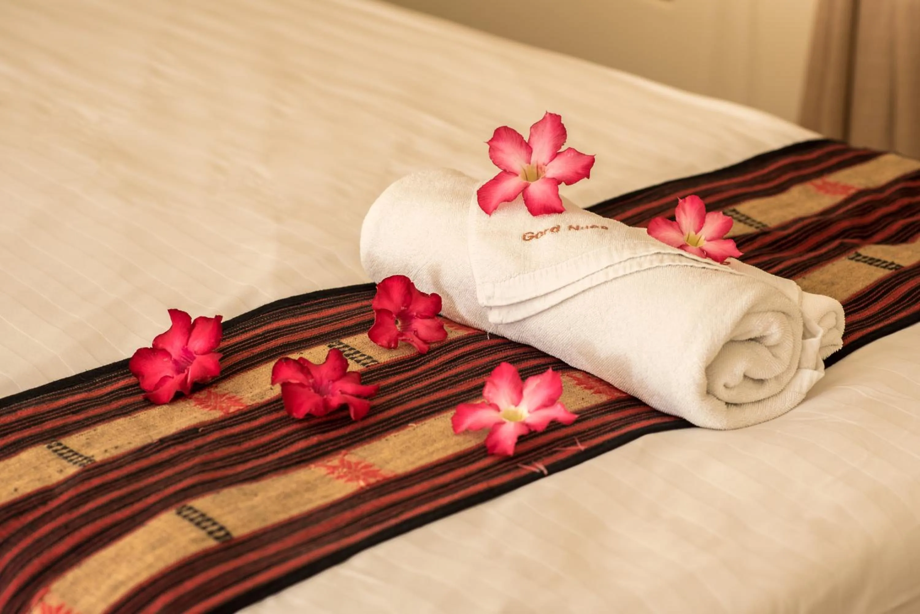 towels, Bed in Gordnuea Boutique House