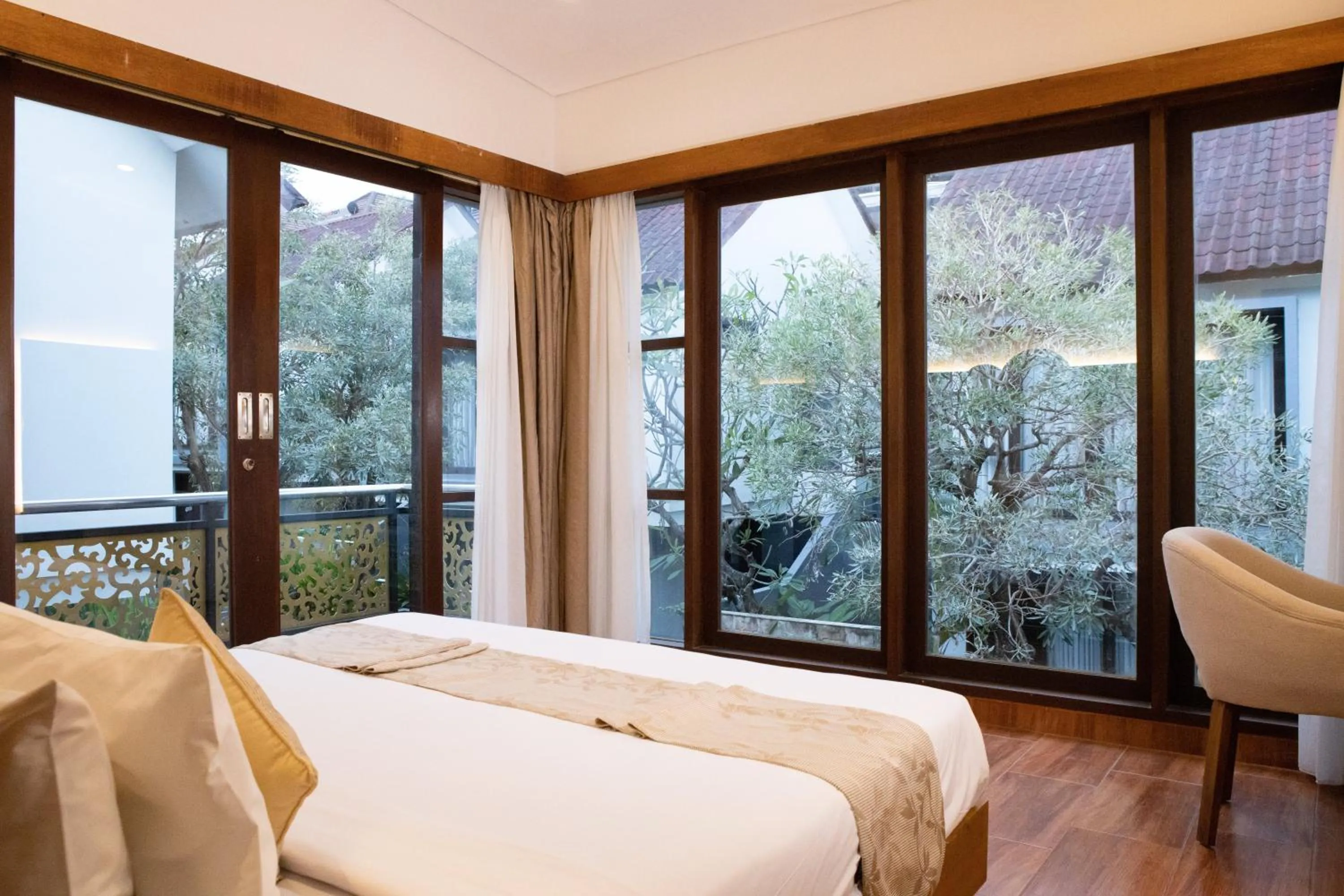 View (from property/room), Bed in Grand Kesambi Resort and Villas Seminyak