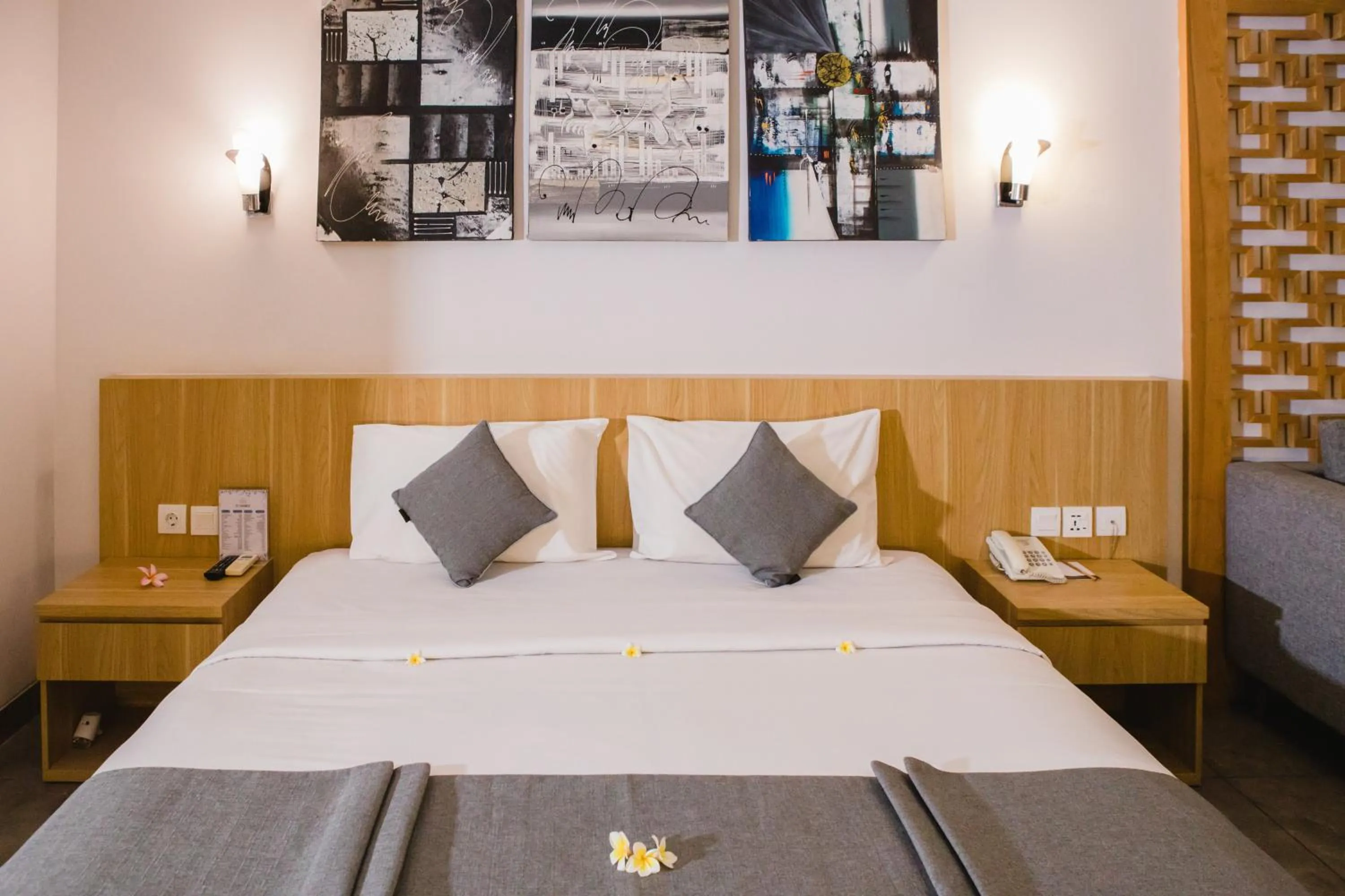 Bed in Grand Kesambi Resort and Villas Seminyak