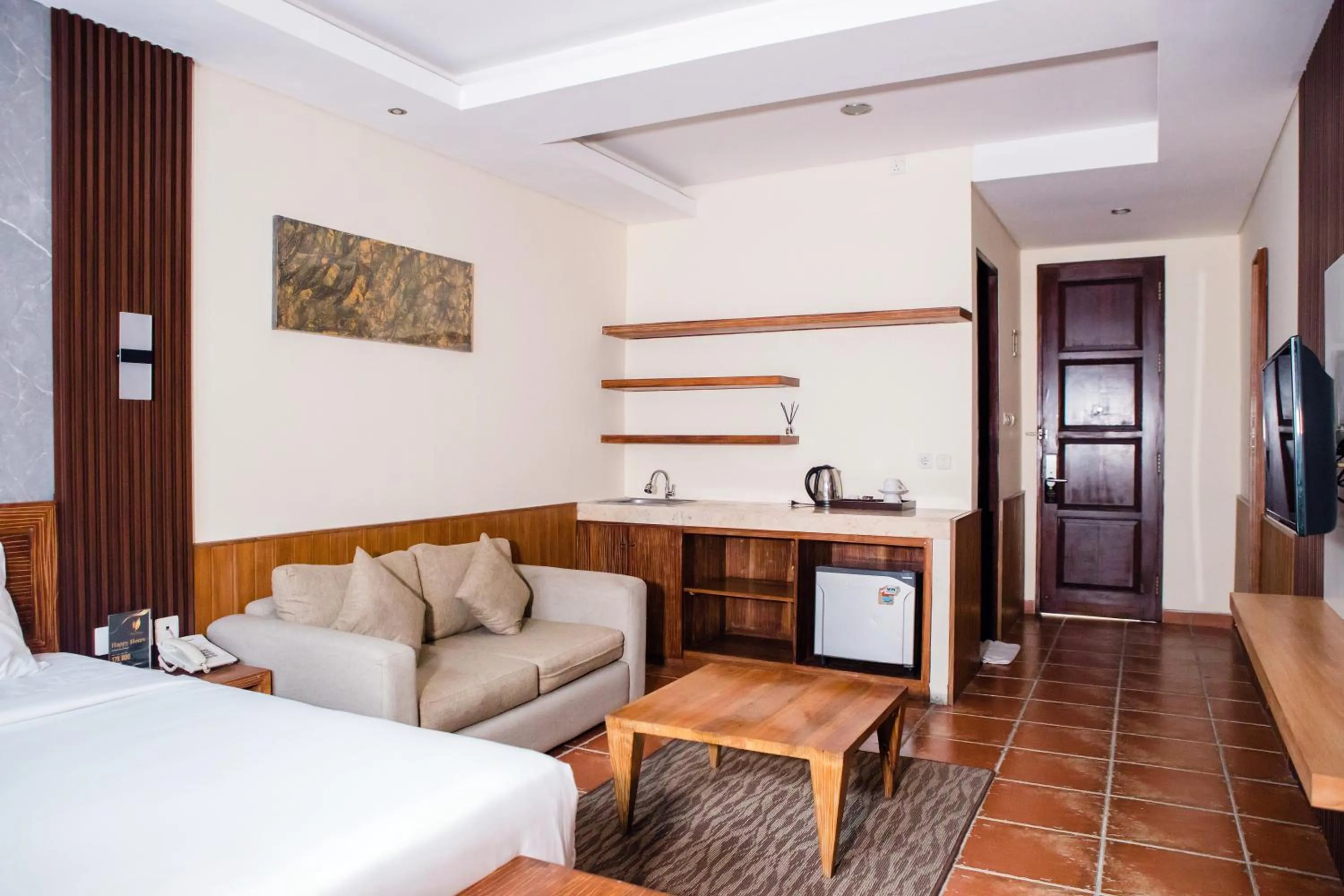 Living room, Bed in Grand Kesambi Resort and Villas Seminyak