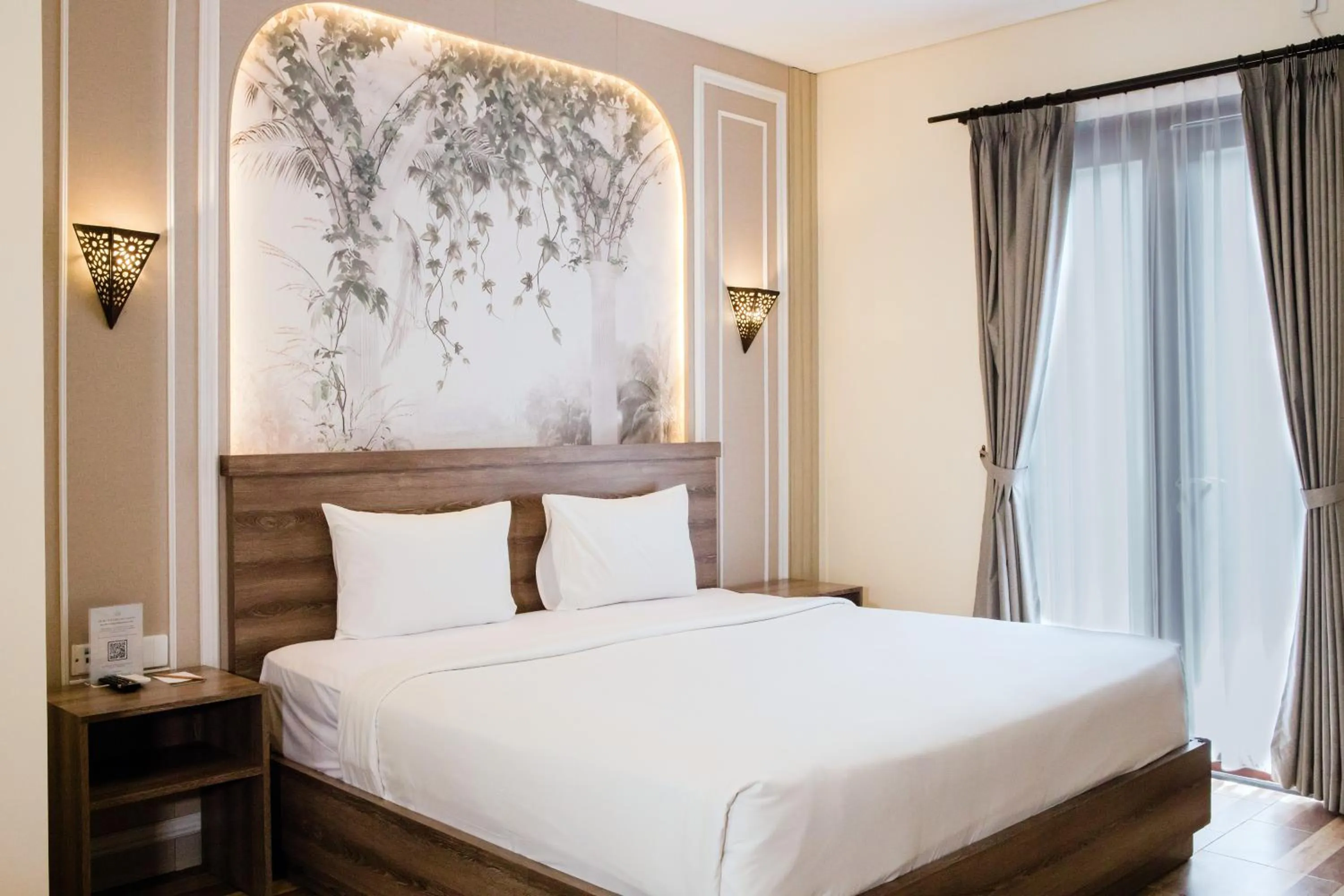 Bed in Grand Kesambi Resort and Villas Seminyak