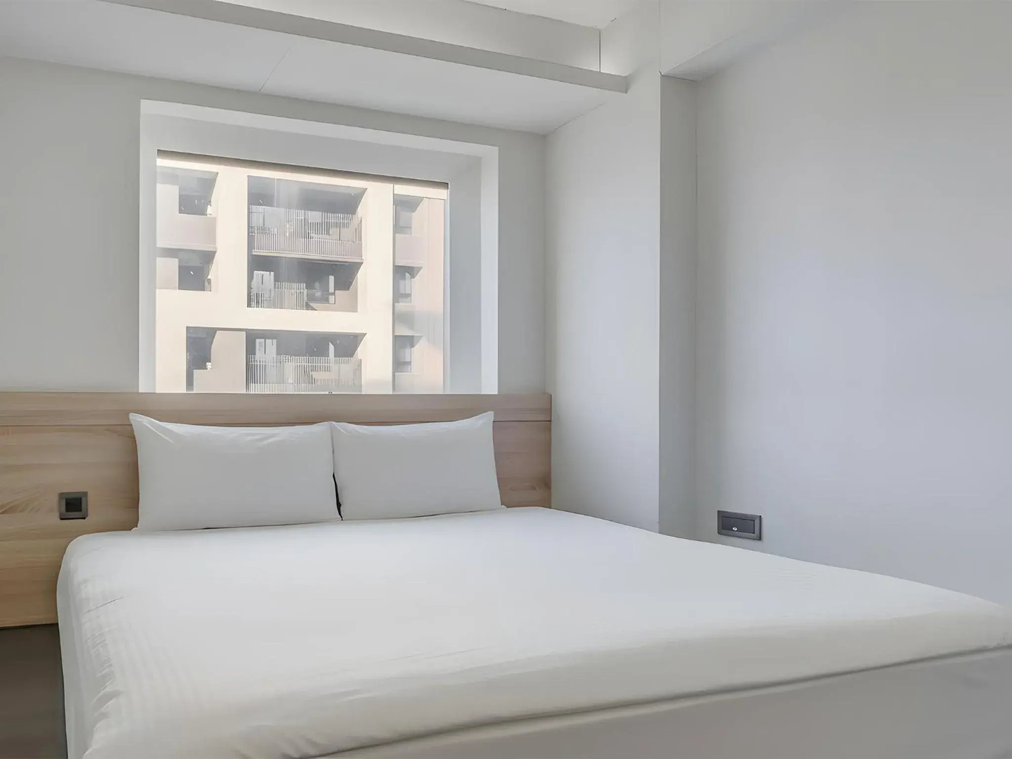 Bed in CHECK inn Taichung Liming Bed in CHECK inn Taichung Liming