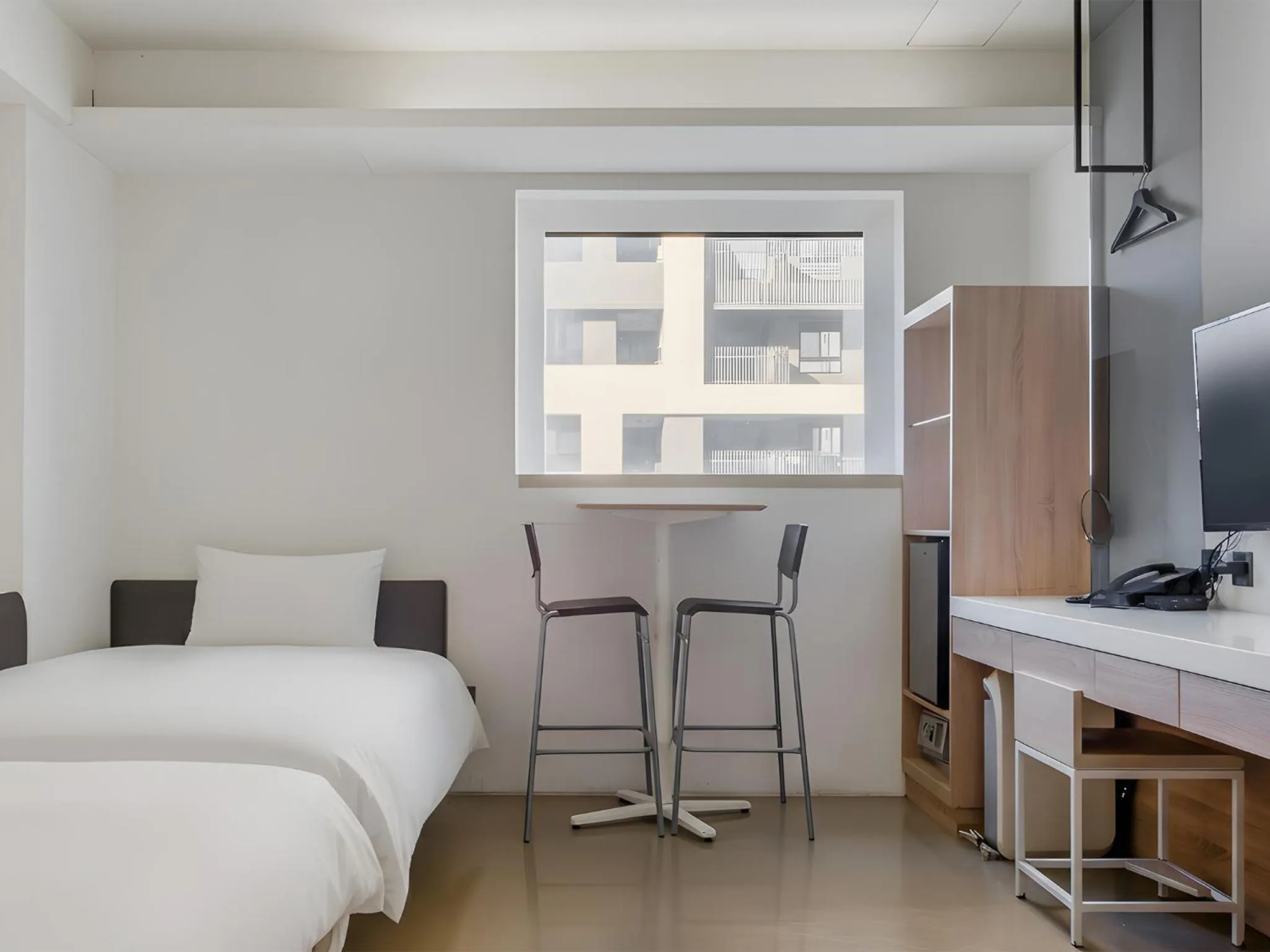 Bed in CHECK inn Taichung Liming