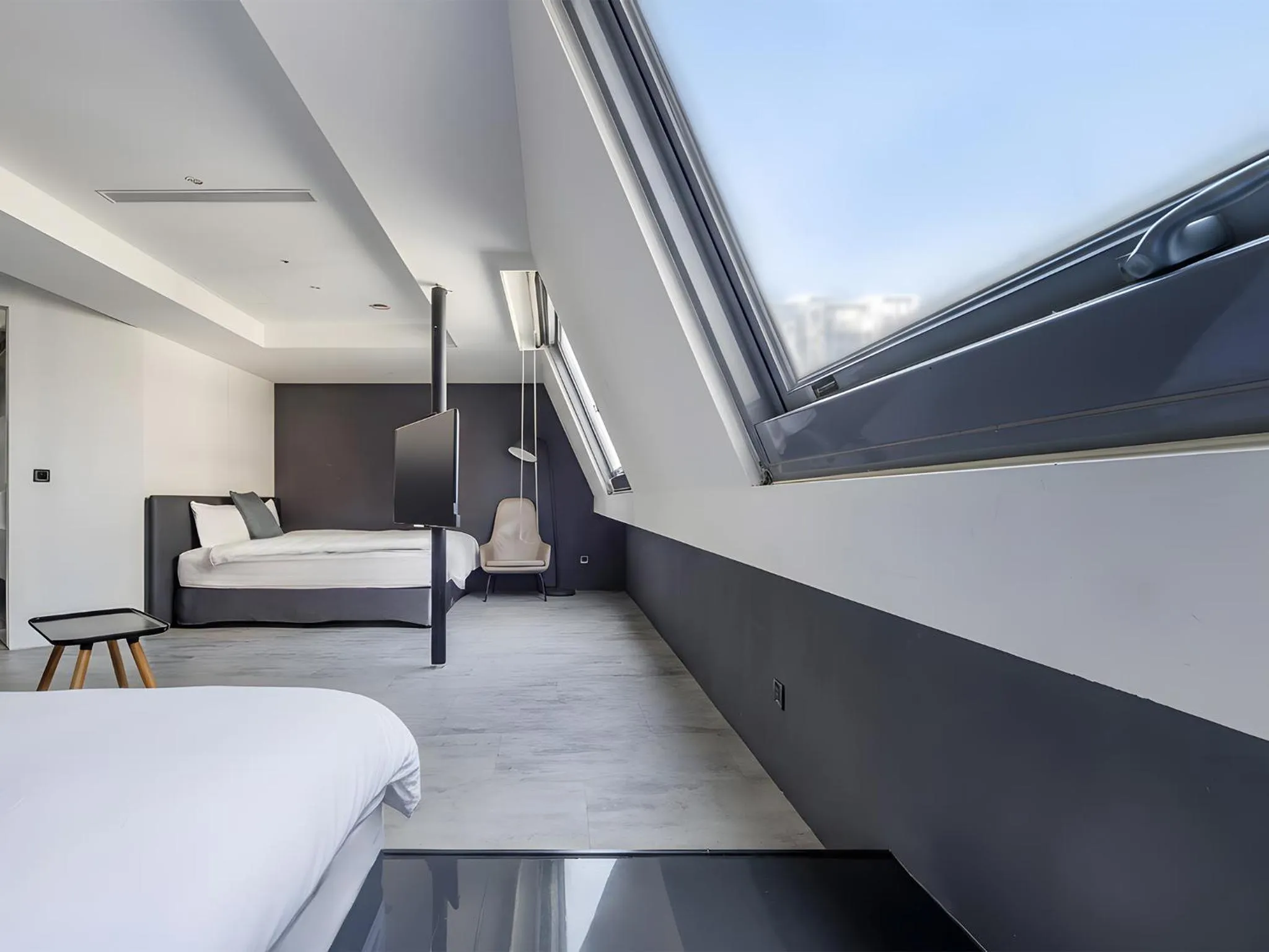 Bed in CHECK inn Taichung Liming