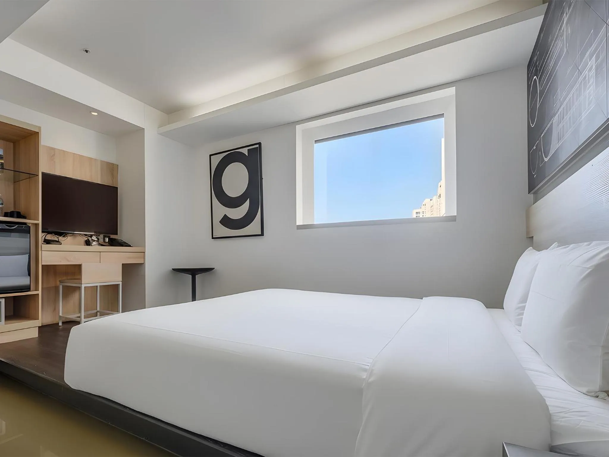 Bed in CHECK inn Taichung Liming