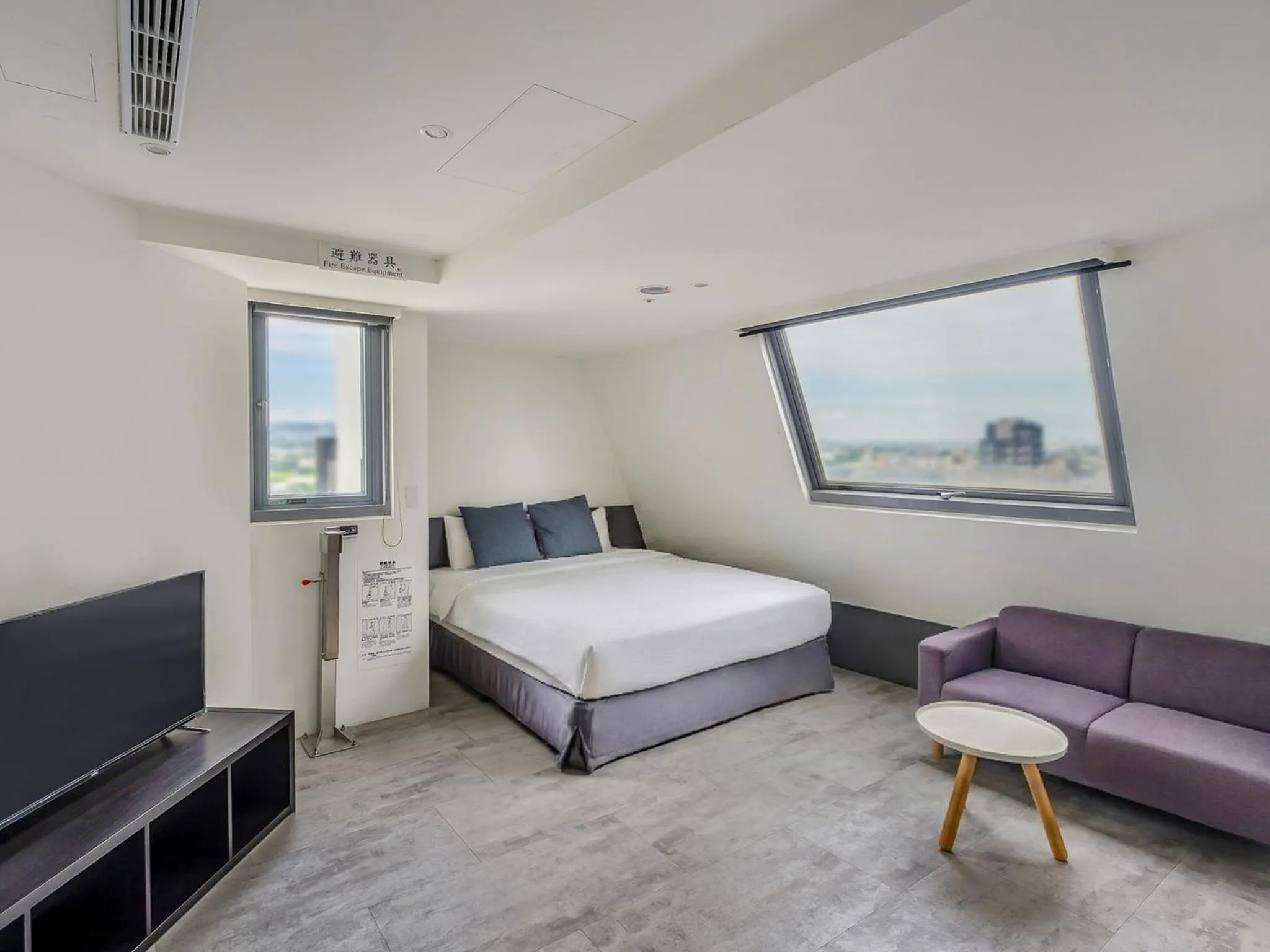 Bed in CHECK inn Taichung Liming