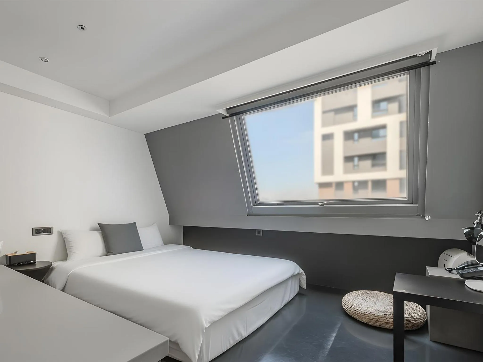 Bed in CHECK inn Taichung Liming