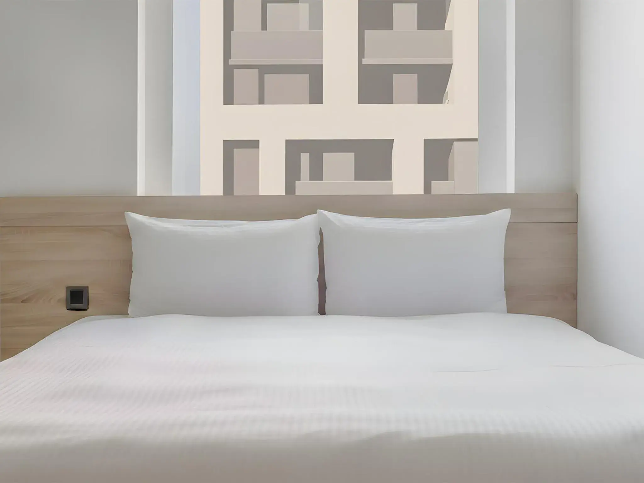 Bed in CHECK inn Taichung Liming Bed in CHECK inn Taichung Liming