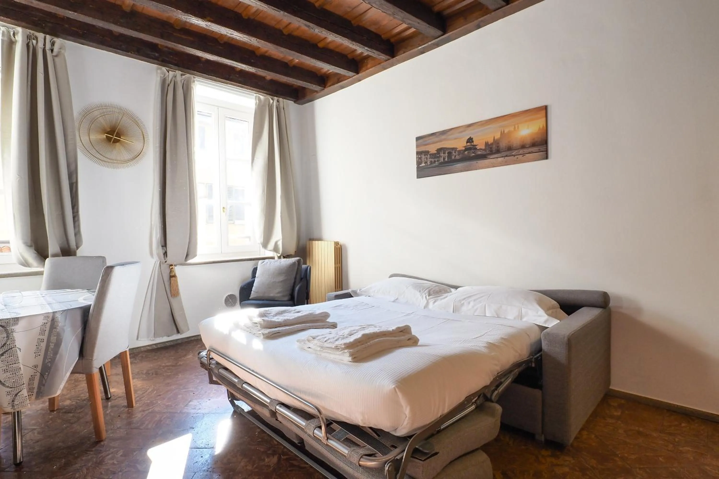 Bed in Mila Apartments Magenta