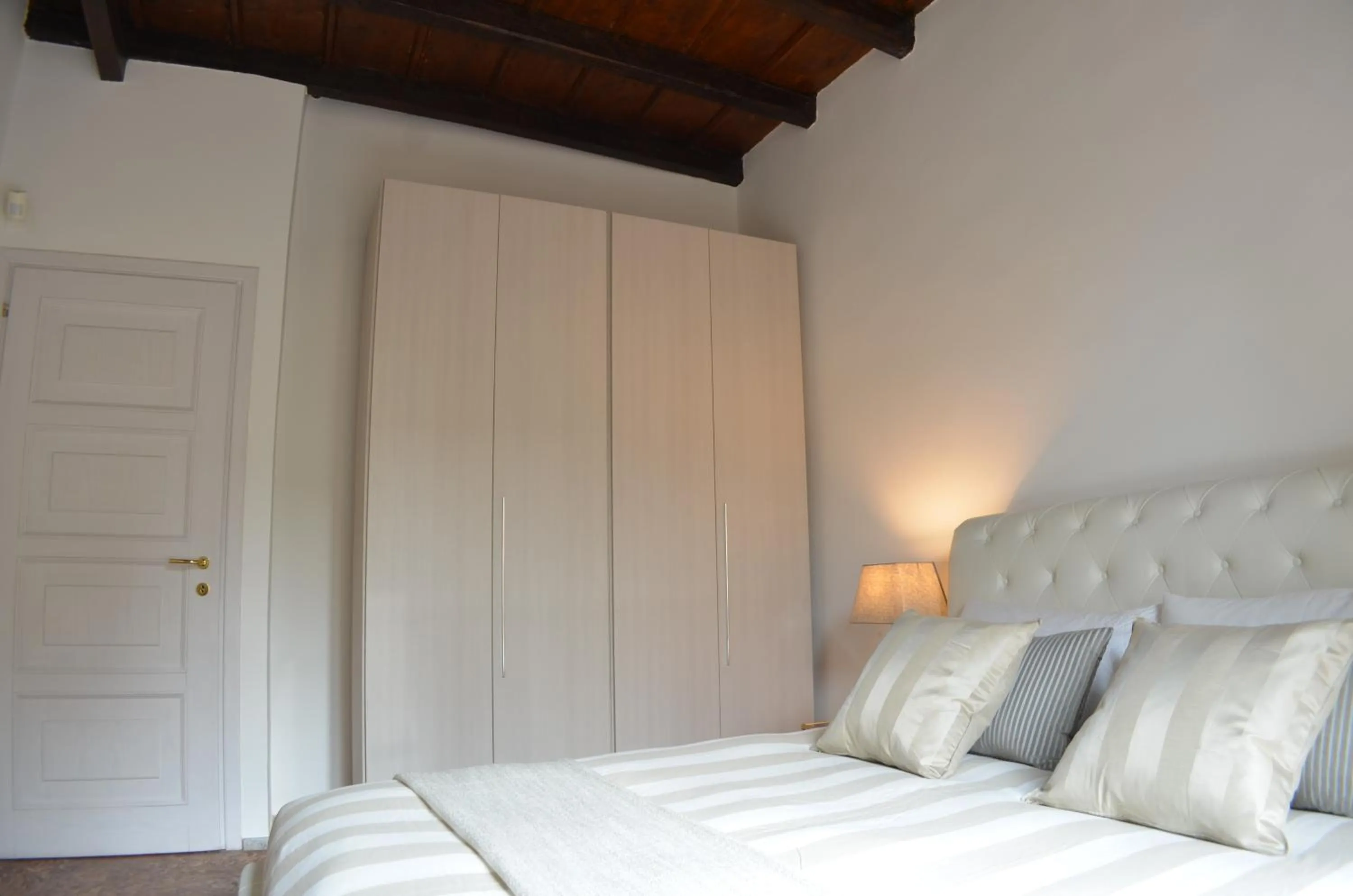 Bed in Mila Apartments Magenta