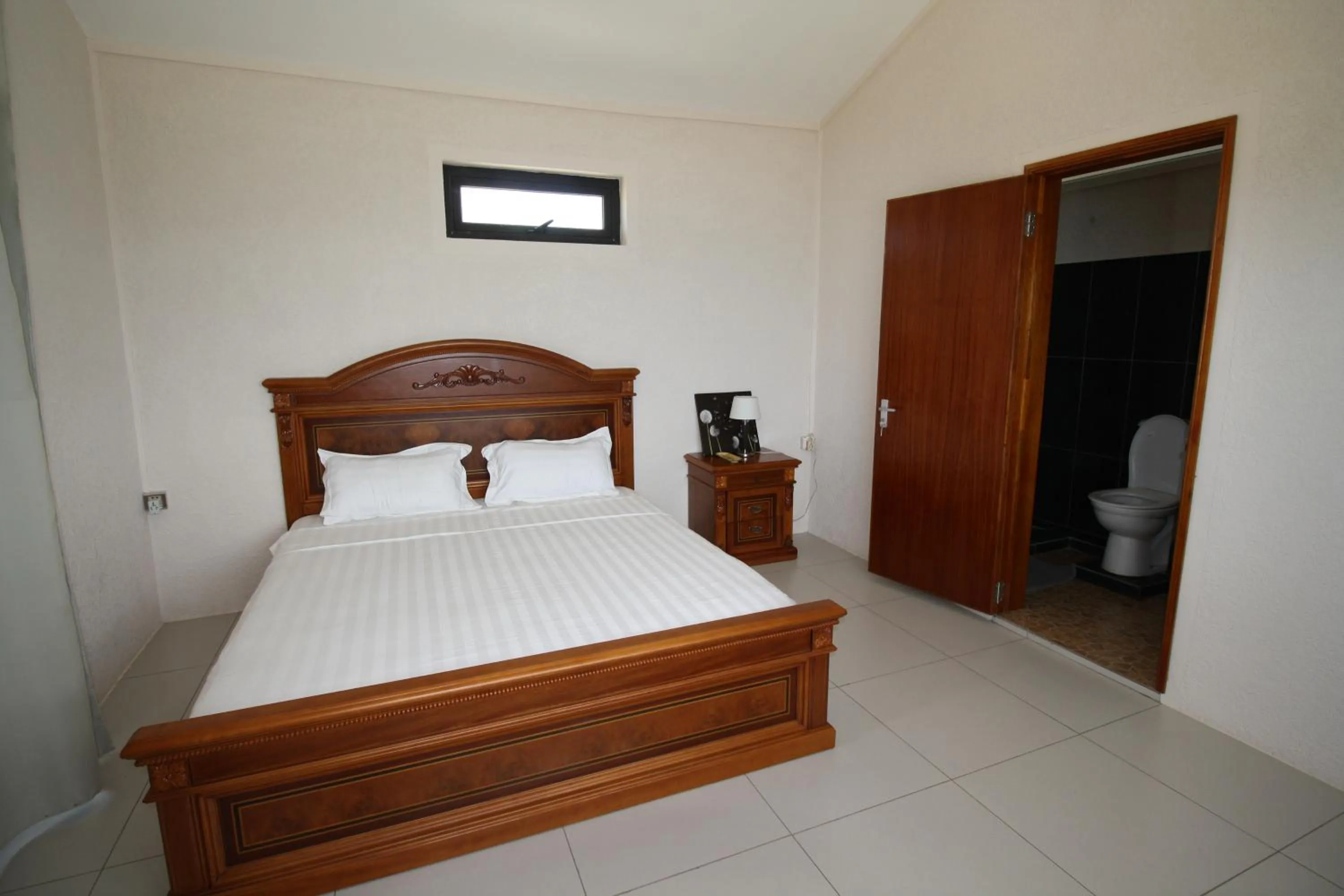 Bed in Villas Vetiver