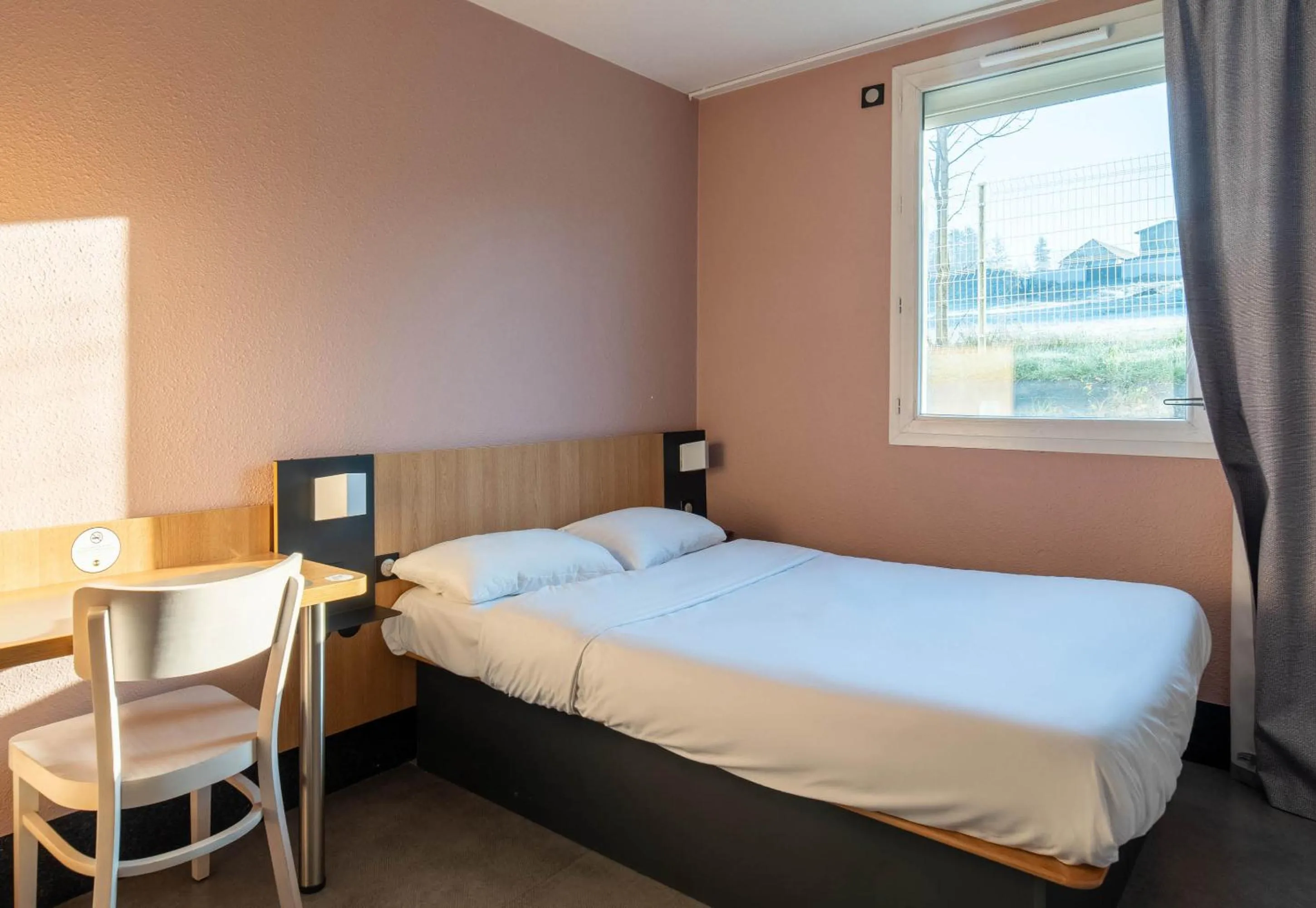 Bedroom, Bed in B&B HOTEL Brive-la-Gaillarde