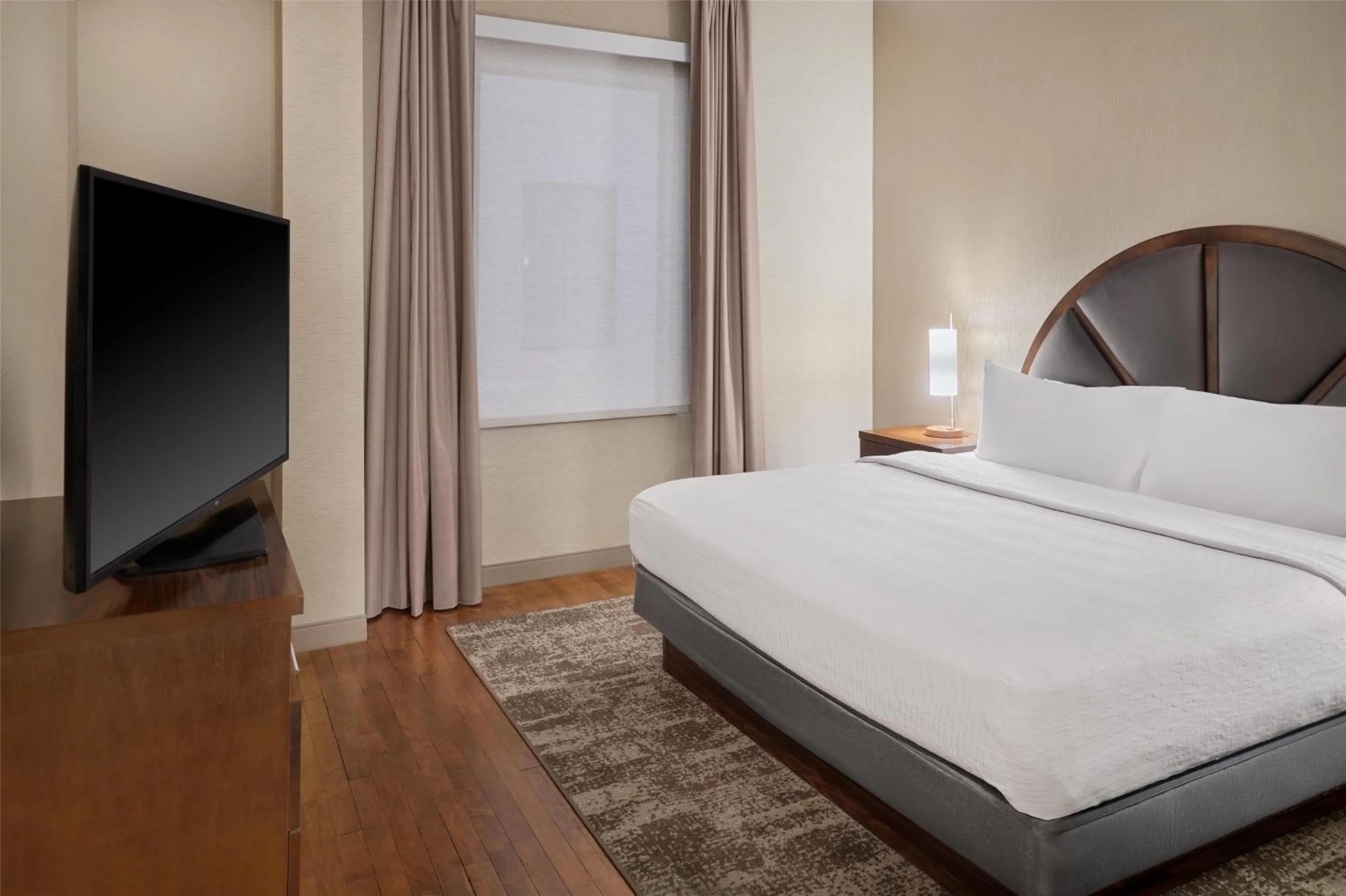 Bed in Homewood Suites by Hilton Grand Rapids Downtown