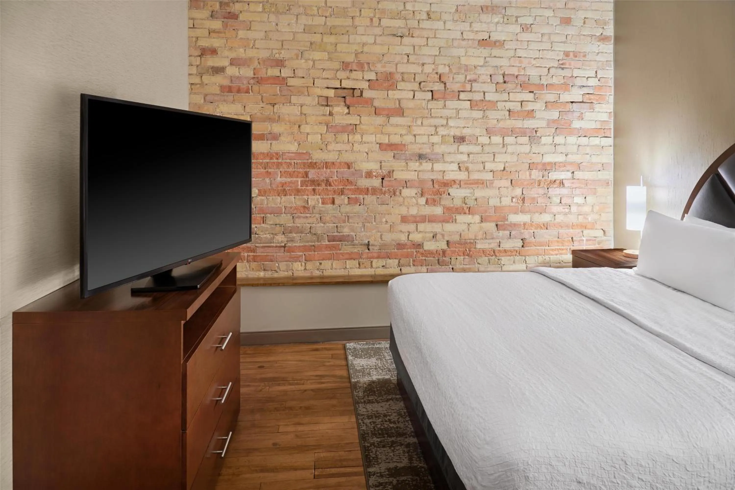 Bed in Homewood Suites by Hilton Grand Rapids Downtown