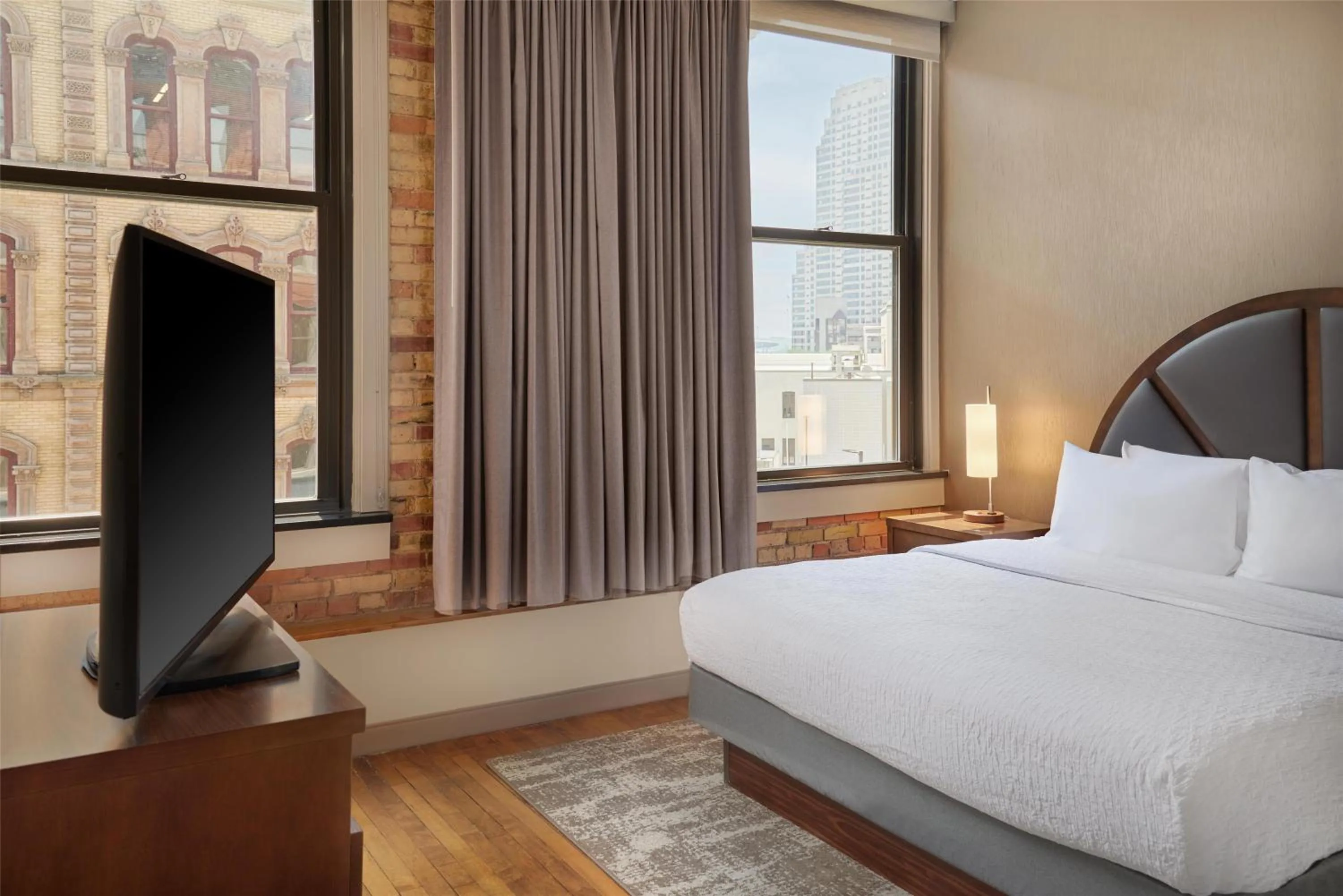 Bed in Homewood Suites by Hilton Grand Rapids Downtown