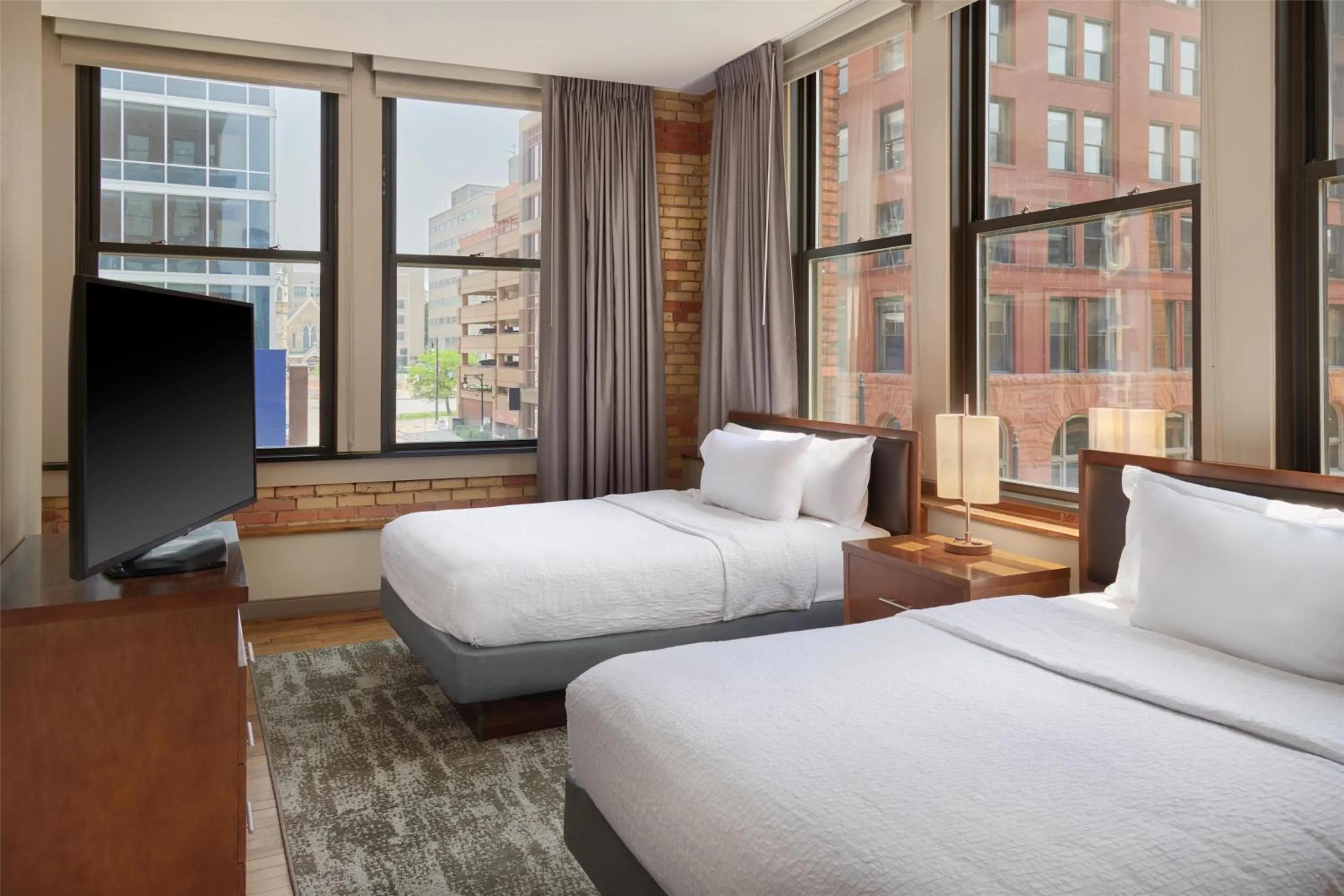 Bed in Homewood Suites by Hilton Grand Rapids Downtown