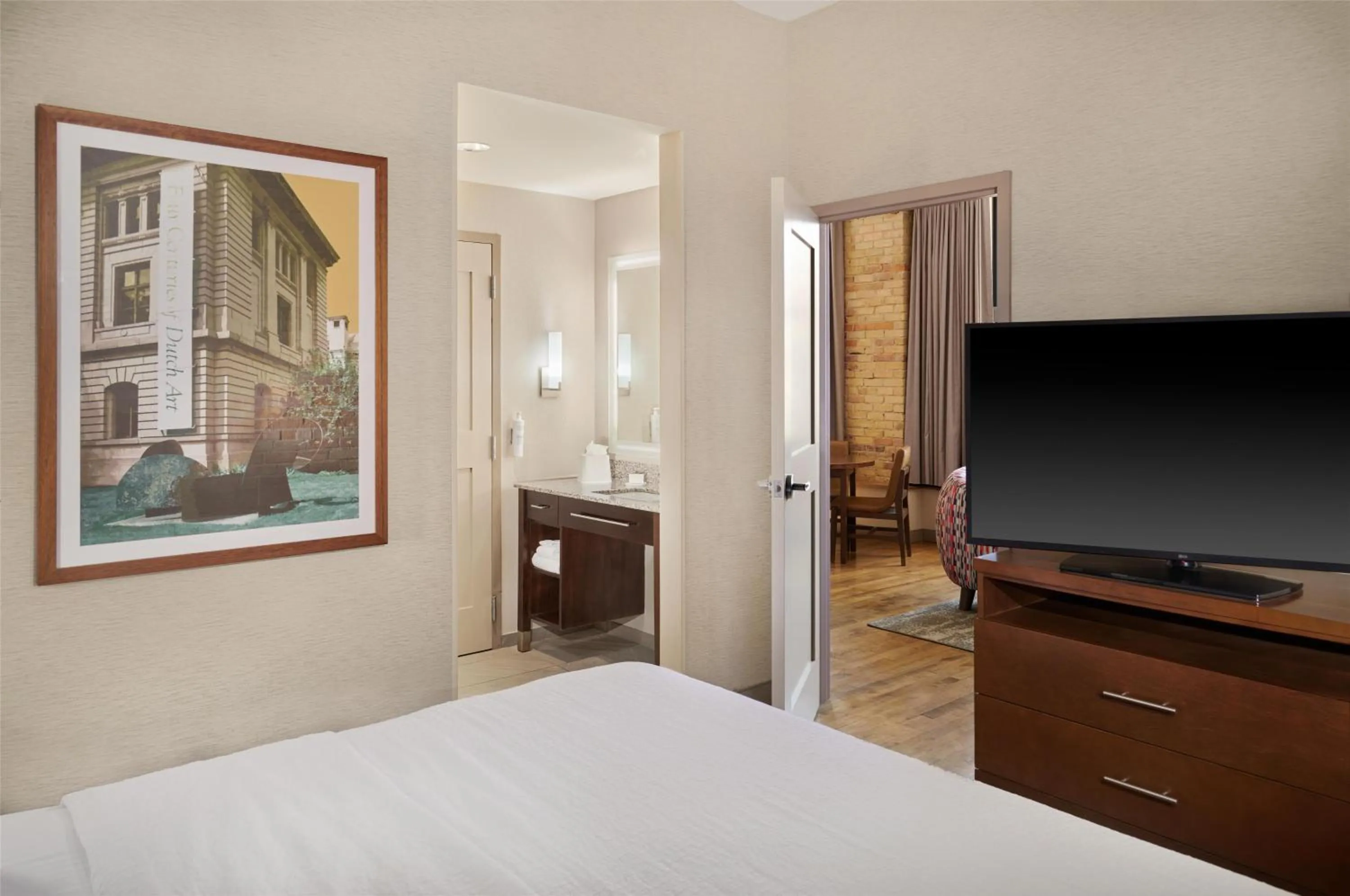 Bed in Homewood Suites by Hilton Grand Rapids Downtown