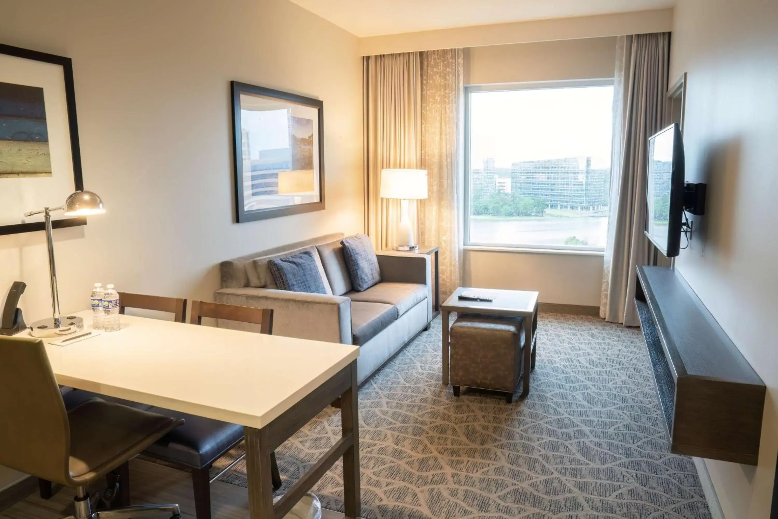 Living room in Embassy Suites by Hilton The Woodlands Living room in Embassy Suites by Hilton The Woodlands