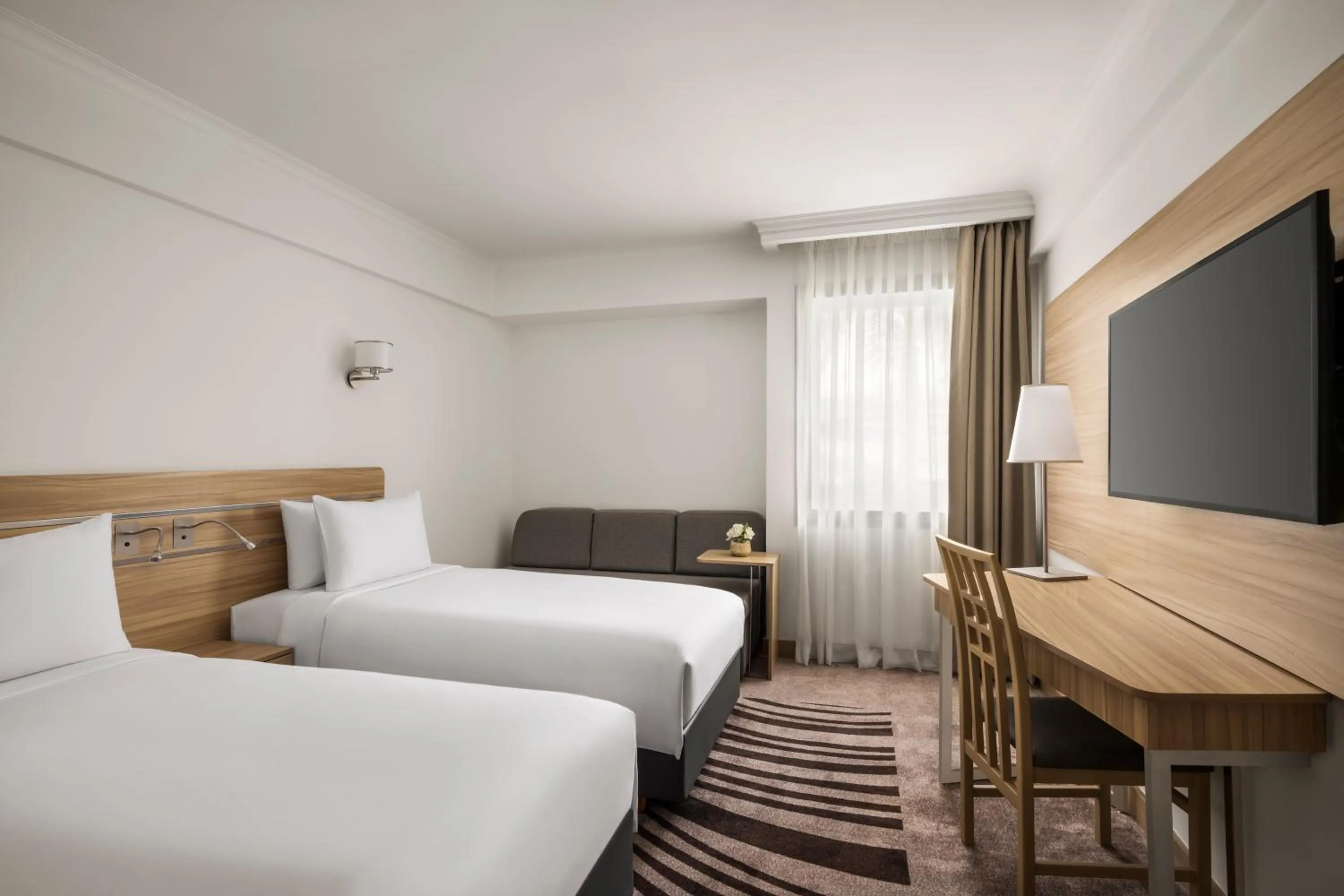 Bed in Novotel Cairo Airport