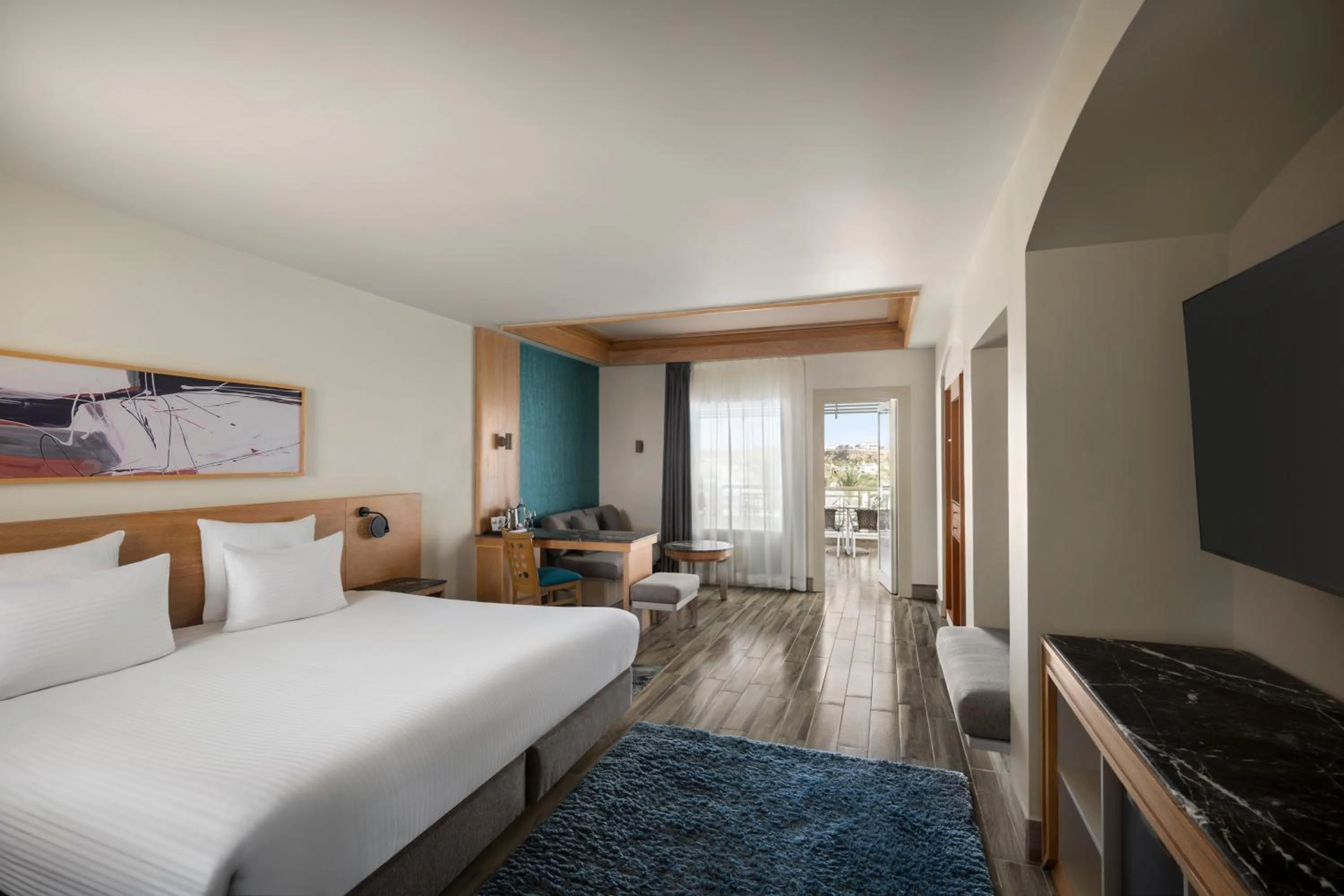 Seating area, Bed in Hotel Novotel Sharm El-Sheikh