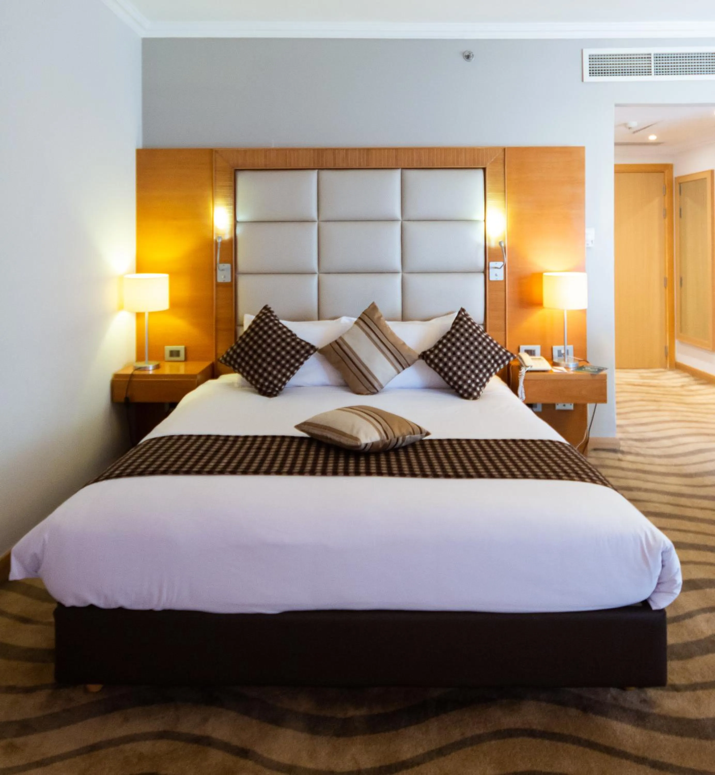 Bed in Mercure Ismailia Forsan Island