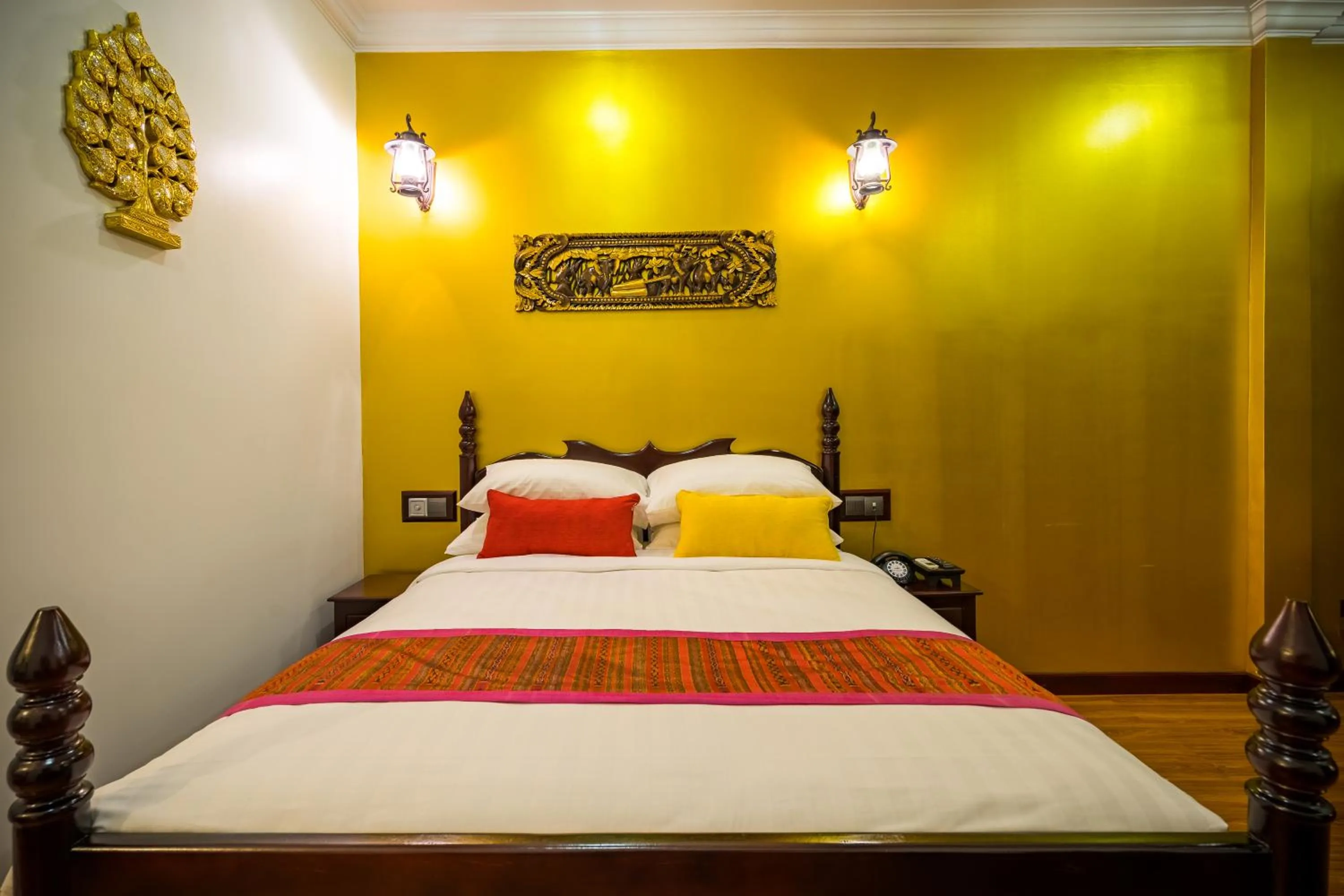 Bed in Beyond Yangon Inn