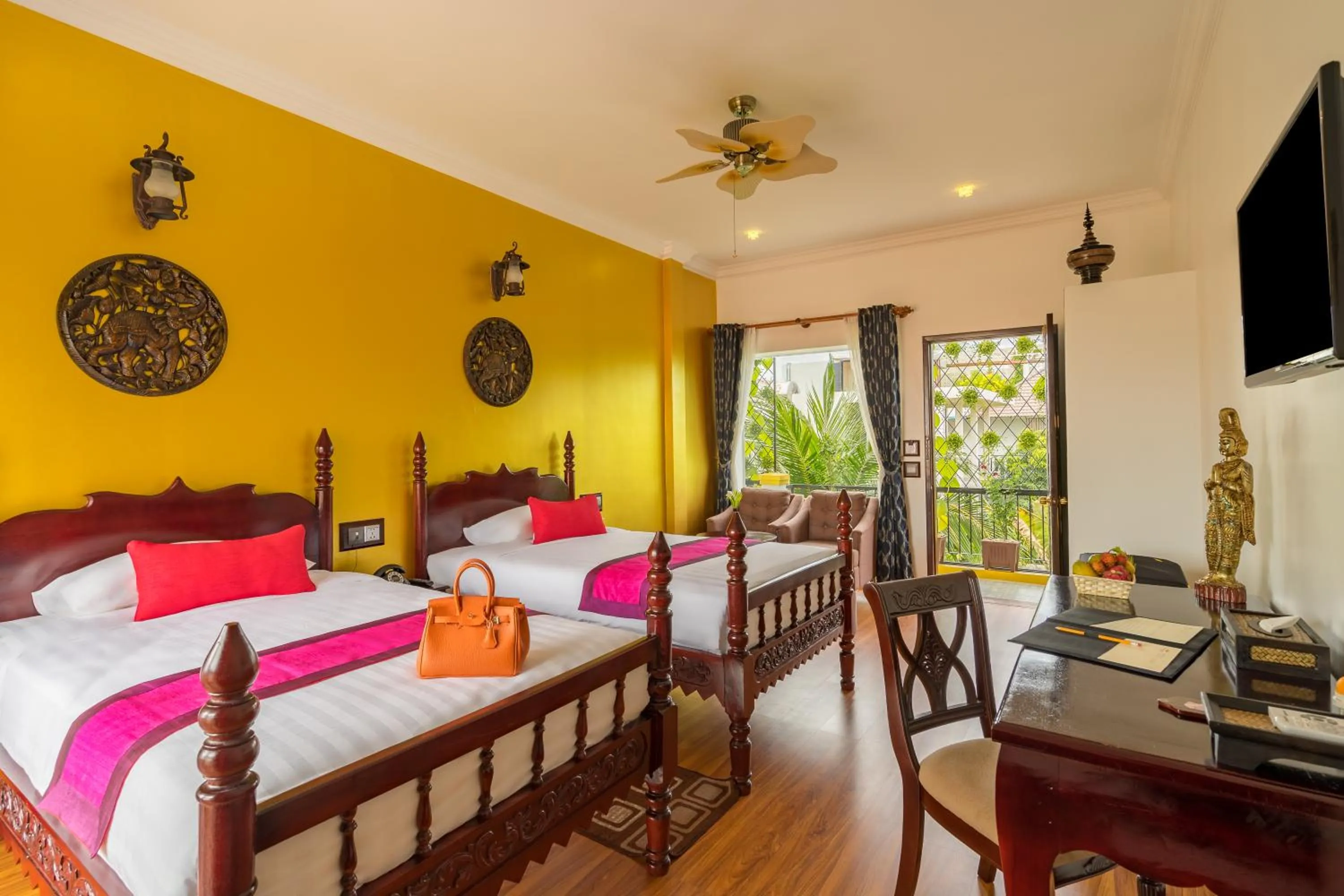 Garden view, Bed in Beyond Yangon Inn