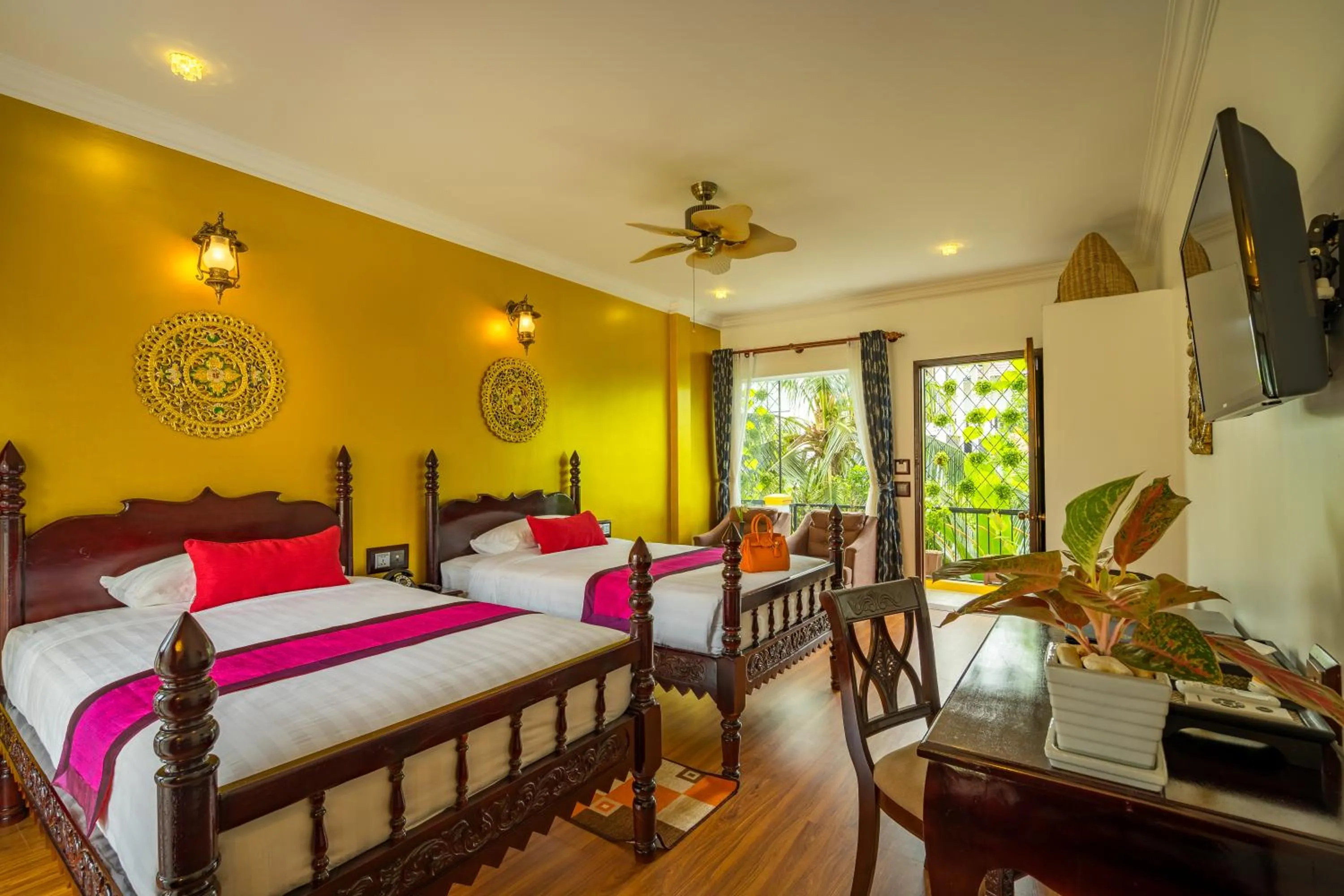 Photo of the whole room, Bed in Beyond Yangon Inn