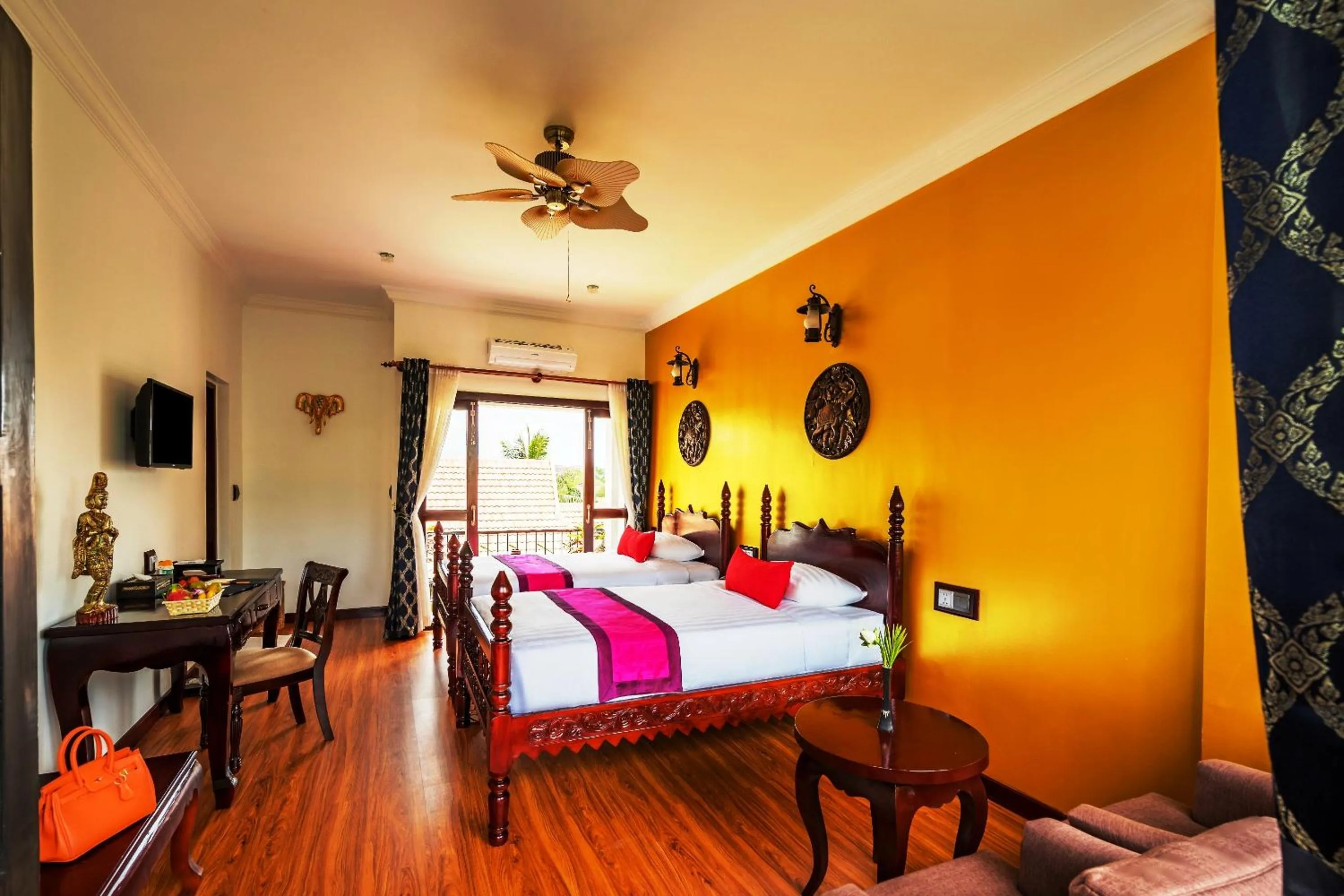 Photo of the whole room, Bed in Beyond Yangon Inn