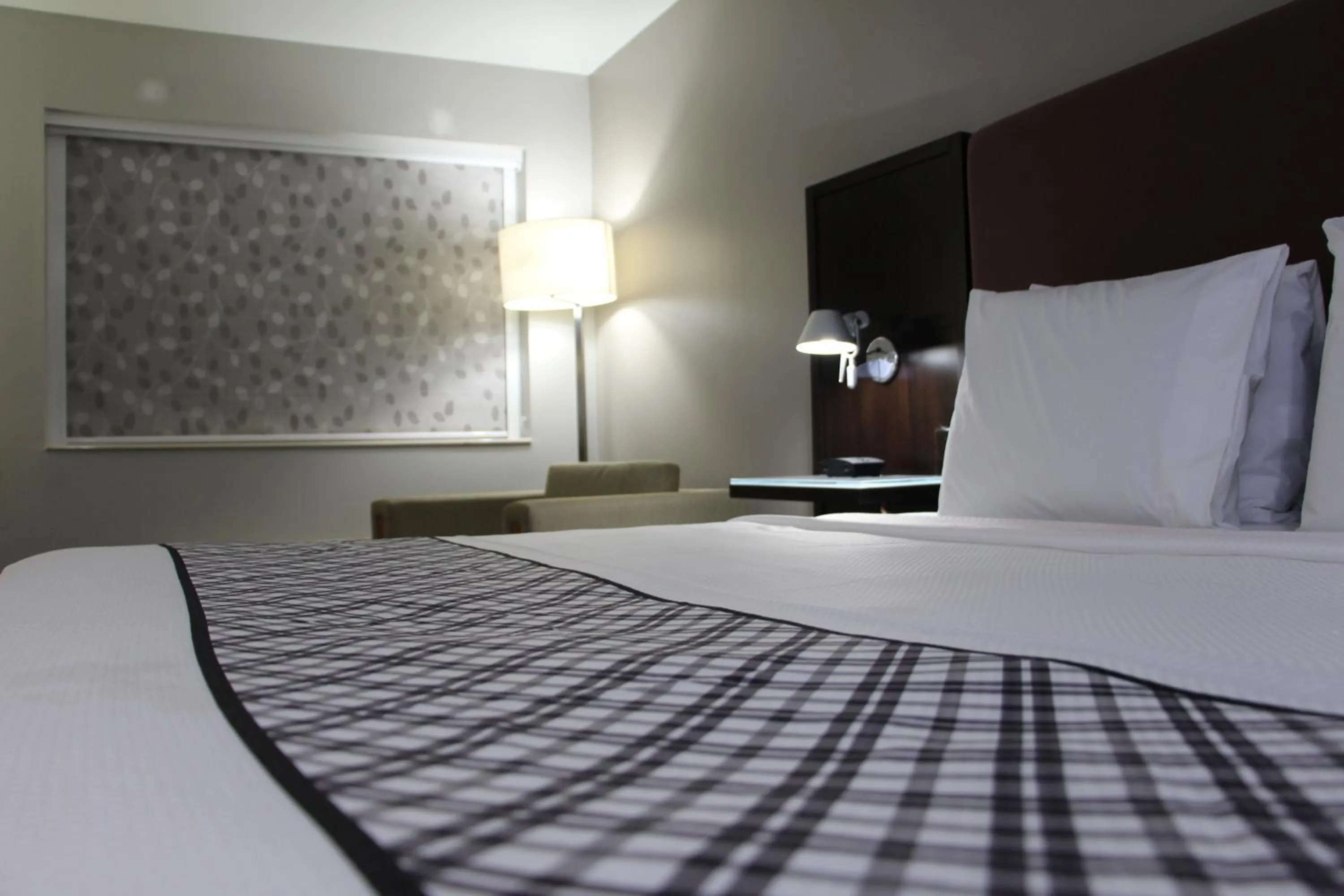 Bed in Westbridge Inn &amp; Suites