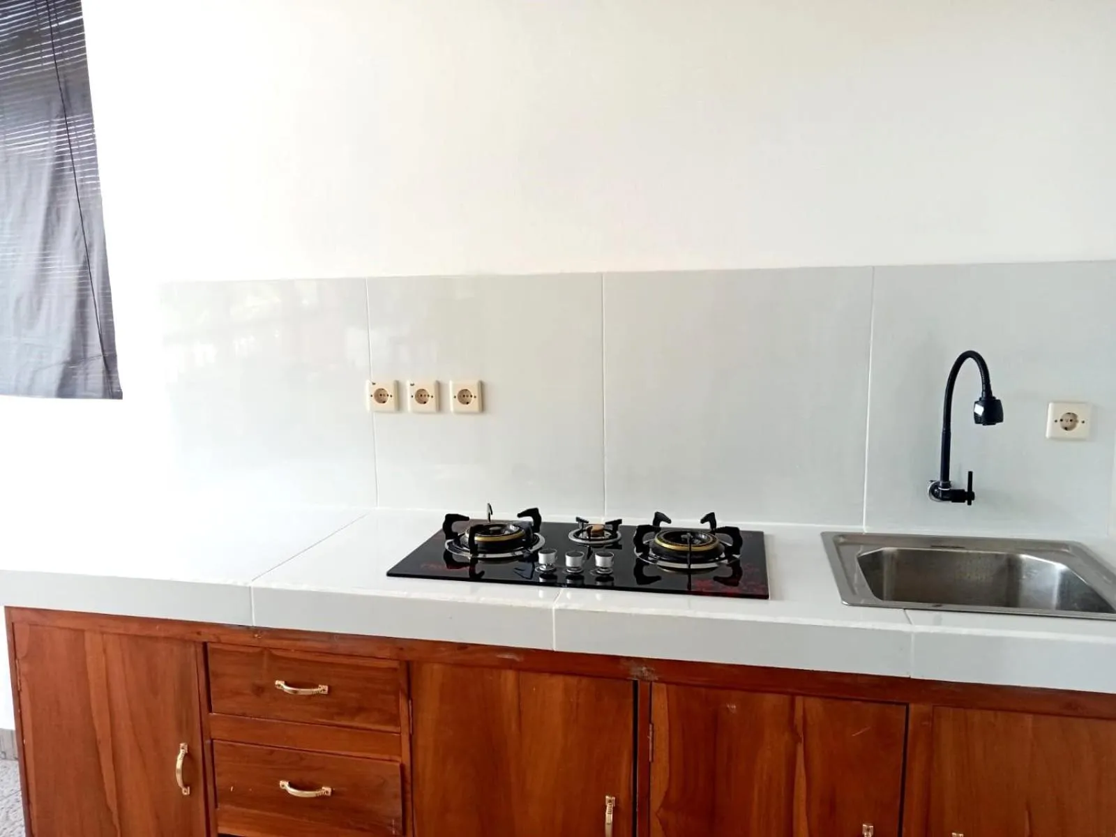Kitchen or kitchenette in Rumah Wayans Lipah