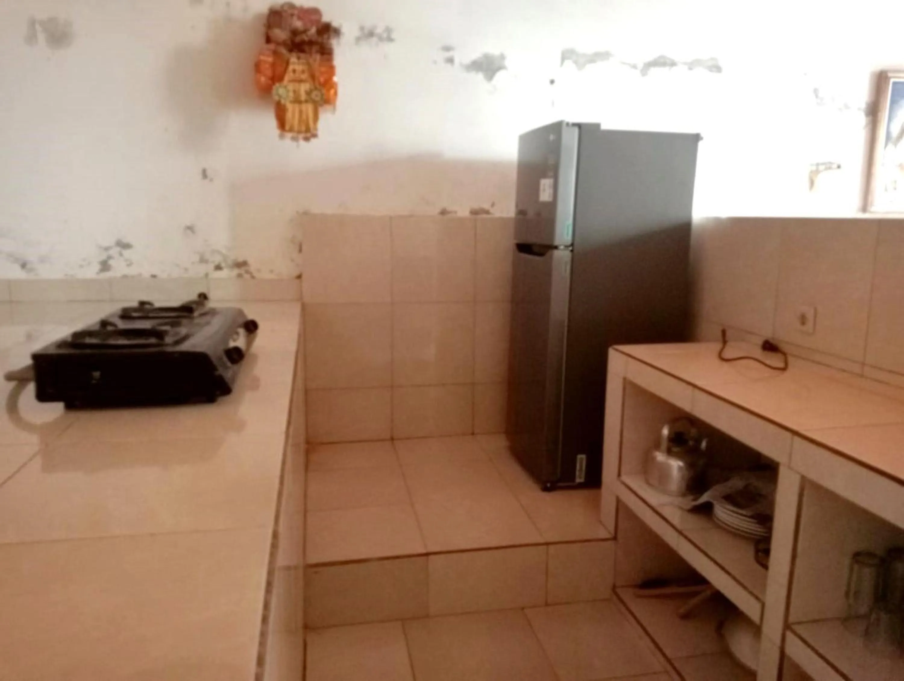 Kitchen or kitchenette in Rumah Wayans Lipah