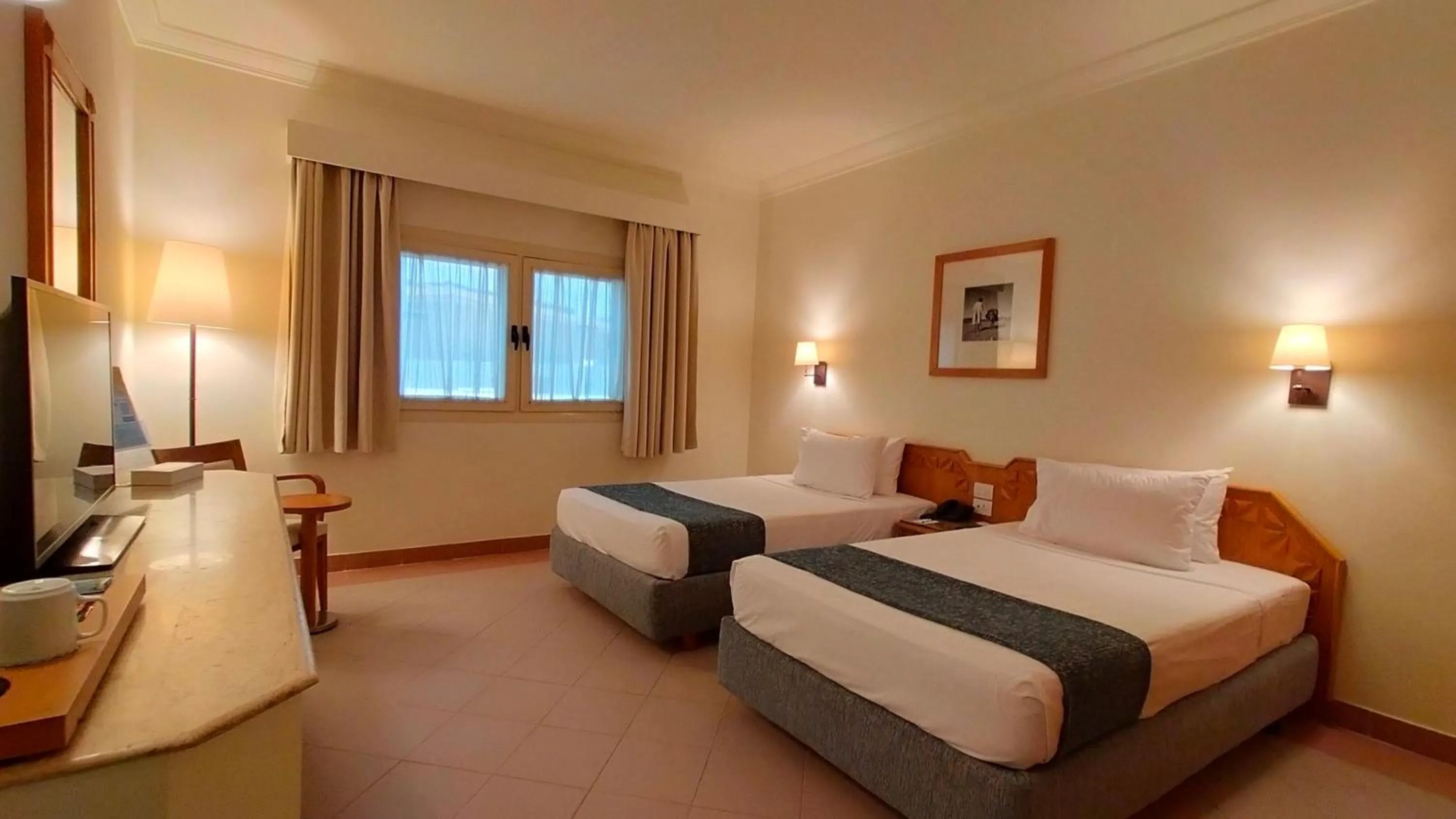 Bed in Camel Dive Club & Boutique Hotel