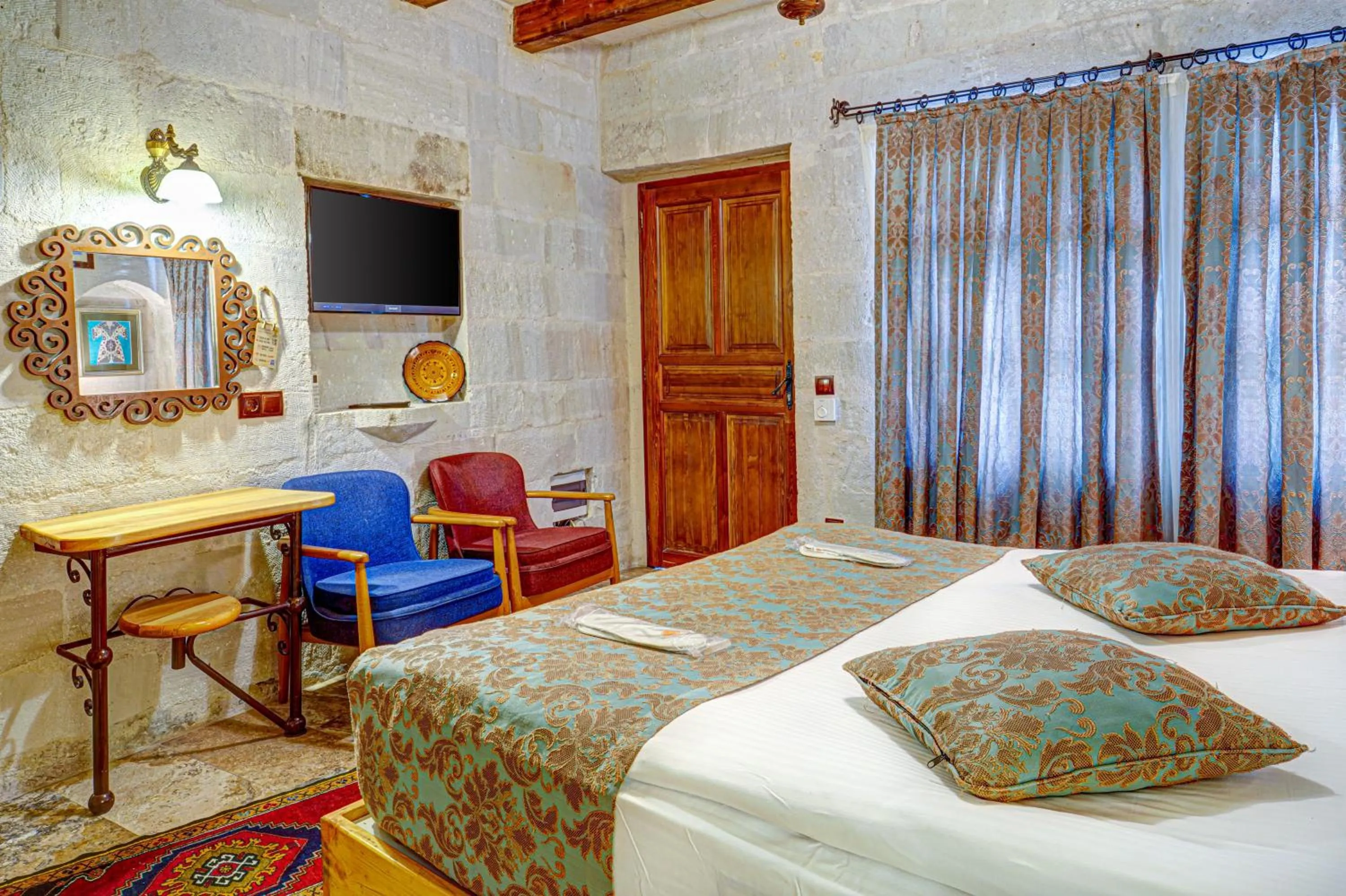 Bed in Aren Cave Hotel And Art Gallery